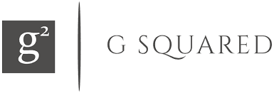 four people around a desk