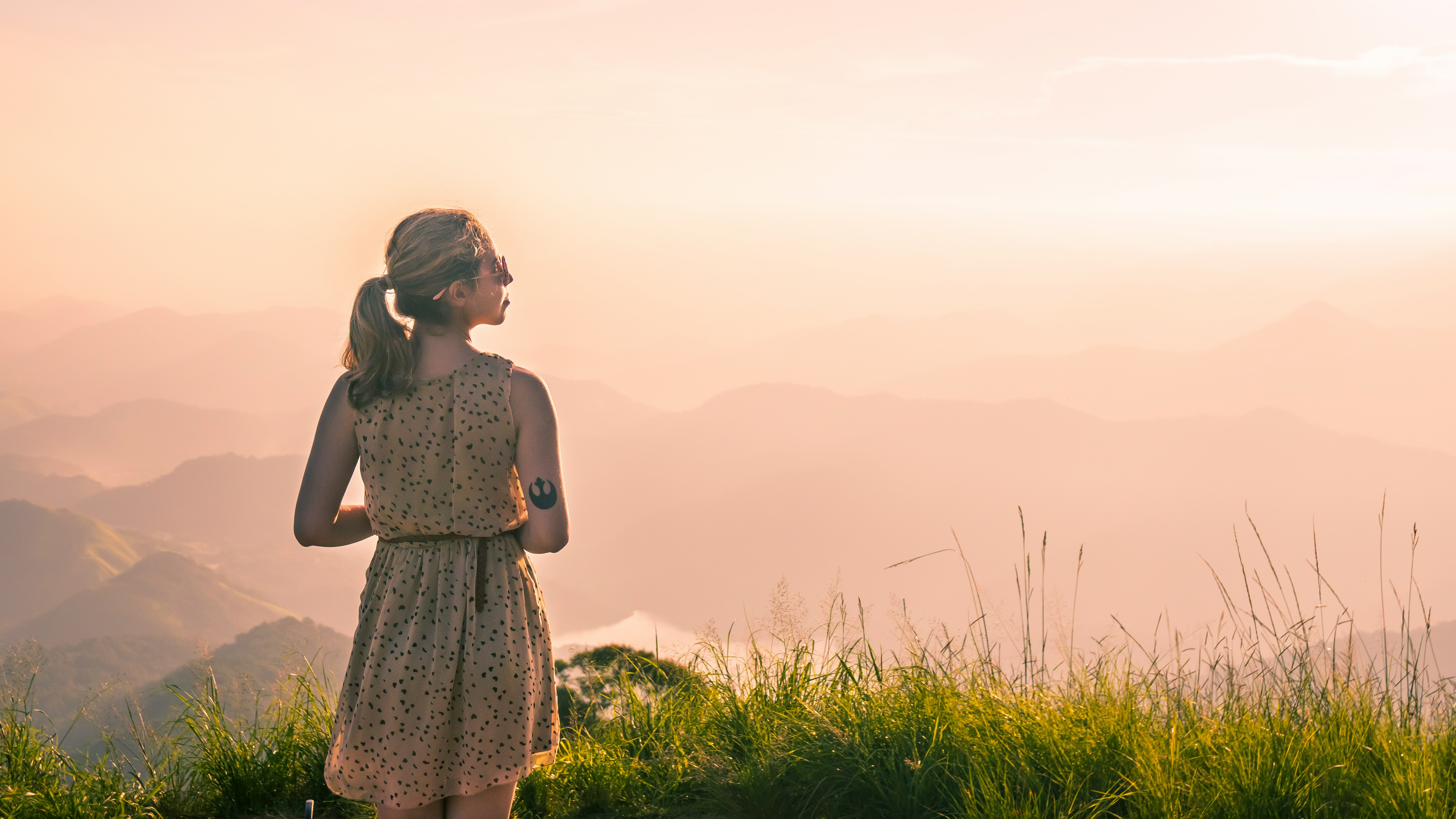 woman enjoying sunset - Deep Autumn Color Analysis