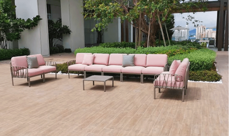 brown wooden chairs and table near glass window