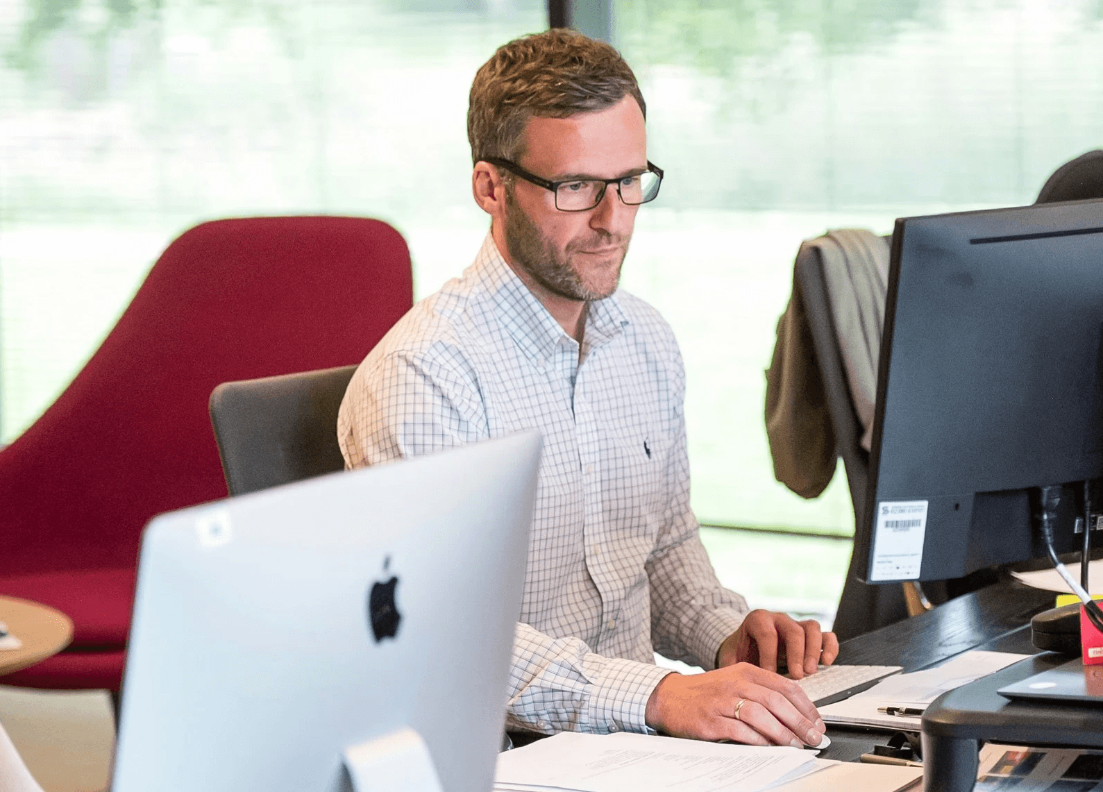 A person using a computer in an office