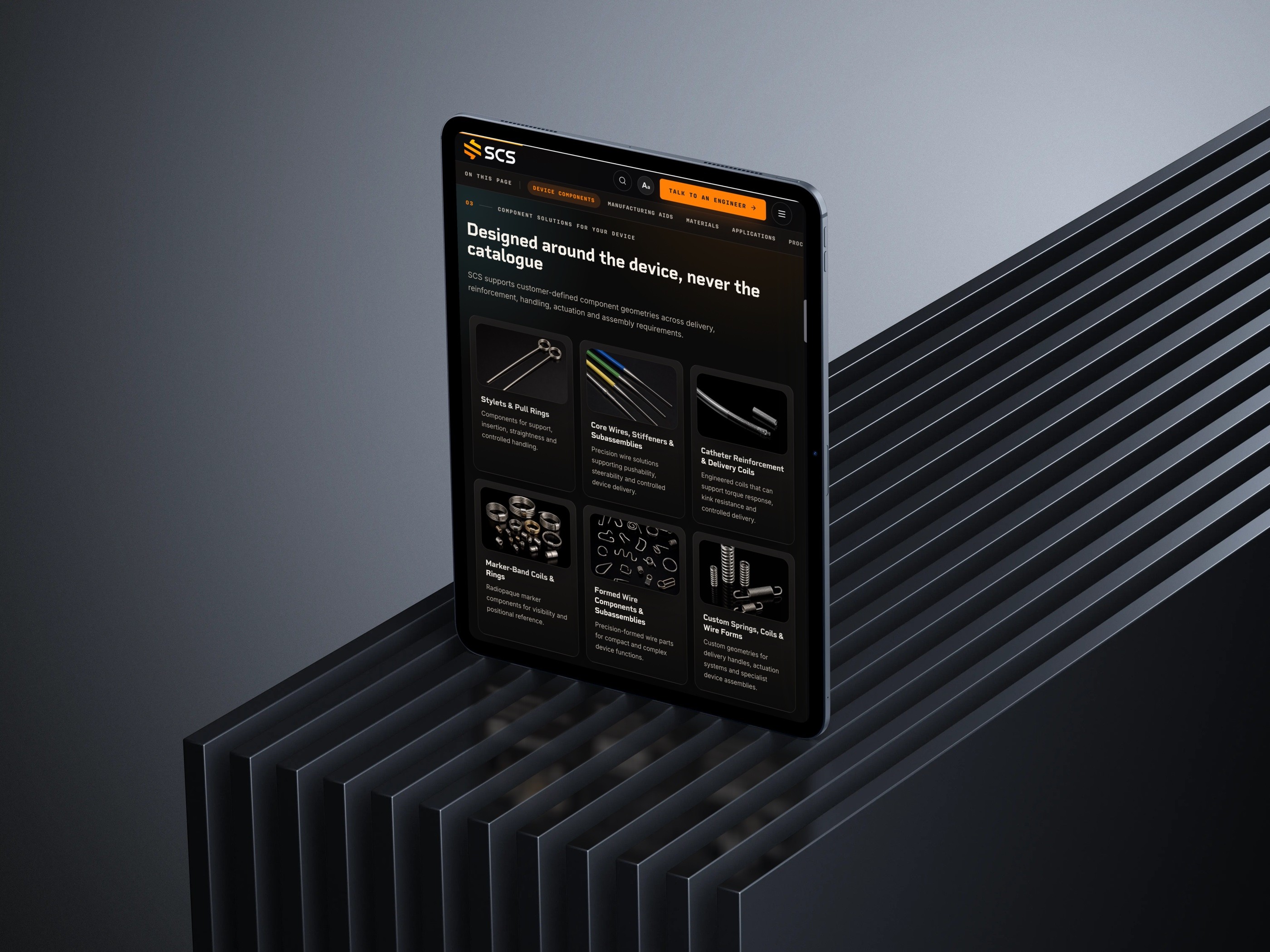 SCS component catalogue displayed on a tablet mockup.