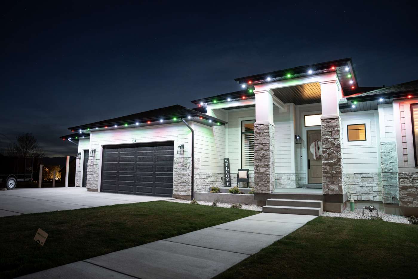Luxury home permanent LED warm white roofline lighting