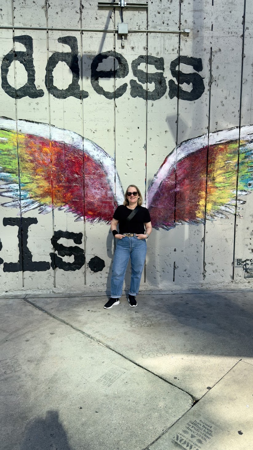 man wearing suit with laptop