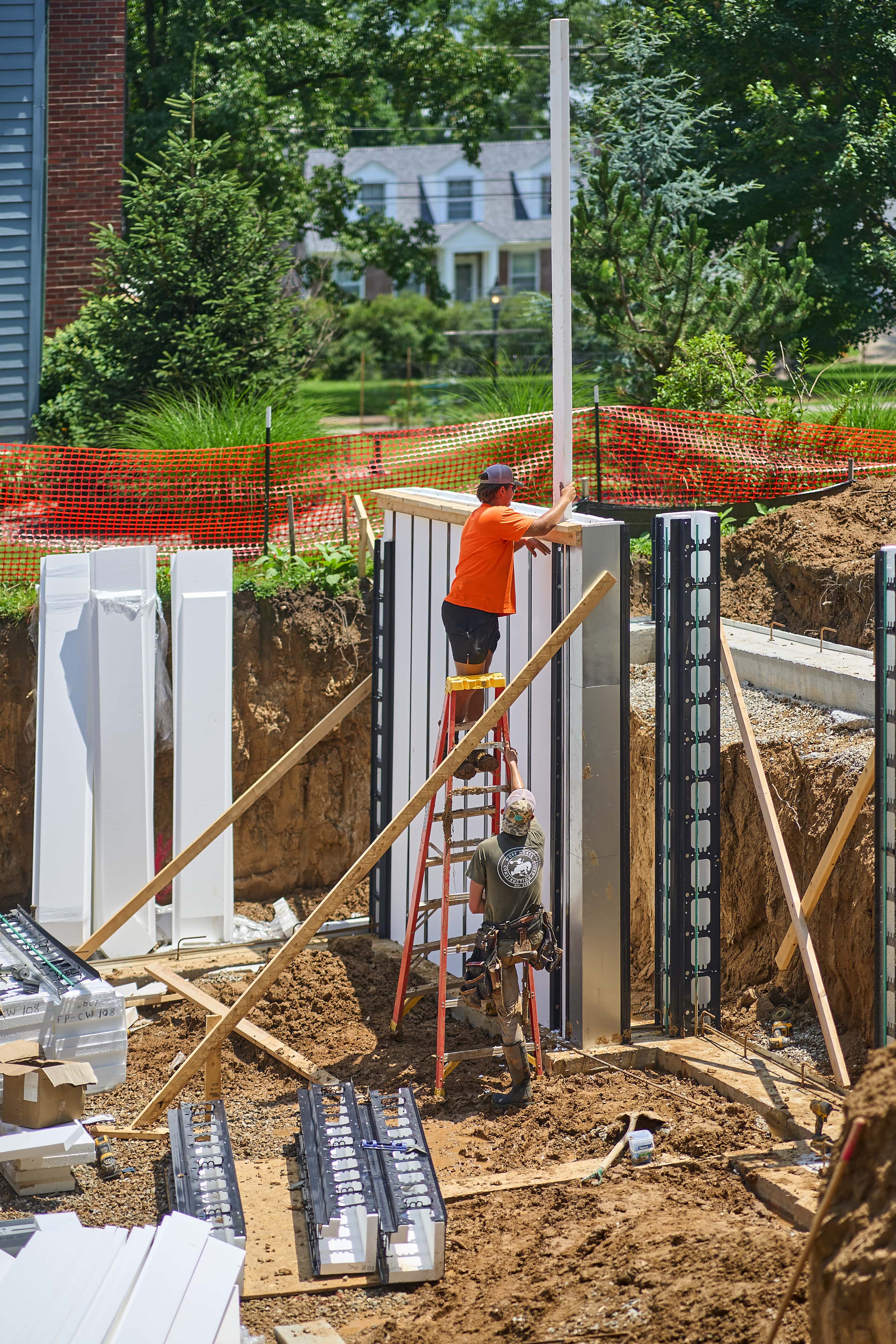 sliding in a Pow-R-Wall panel into place
