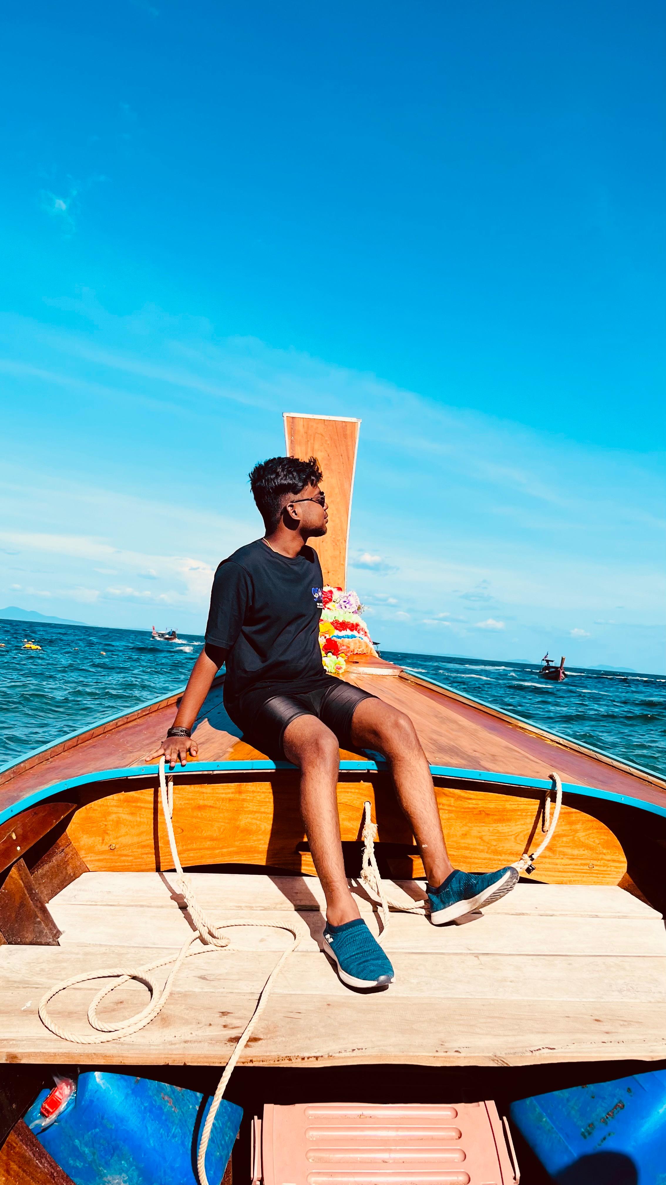 A young man riding a bicycle