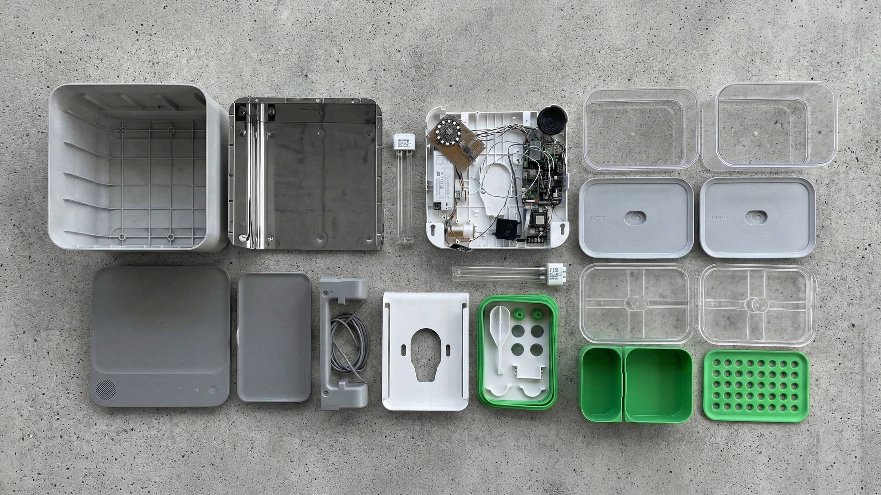 Streetside billboard with flyposters of the Batch.Works brand and illustrations