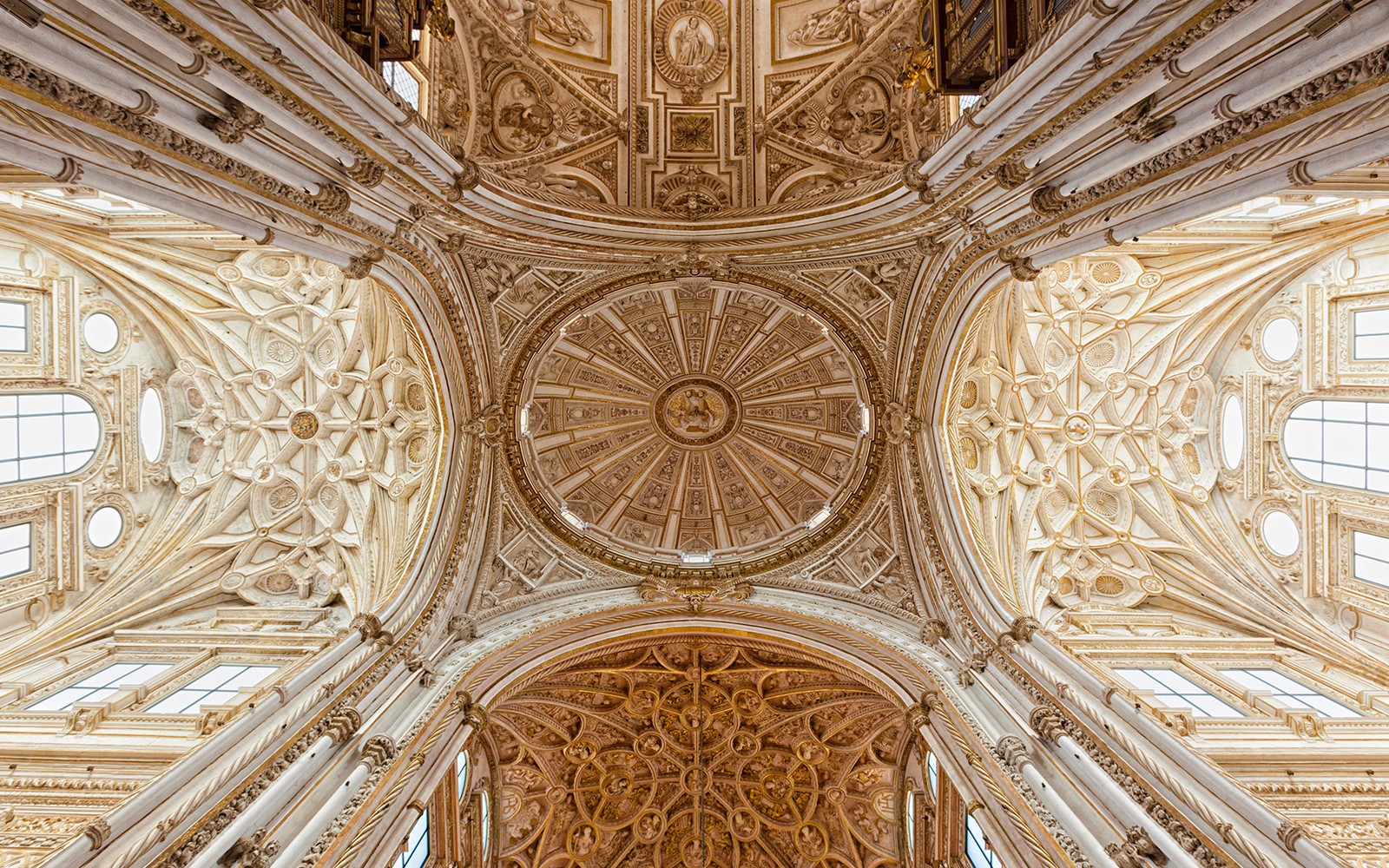 Ceiling of the Mosque-Cathedral of Córdoba, intricate design, viewed on a day trip from Seville.