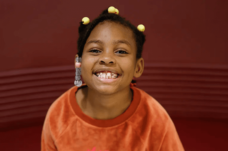 A girl smiling