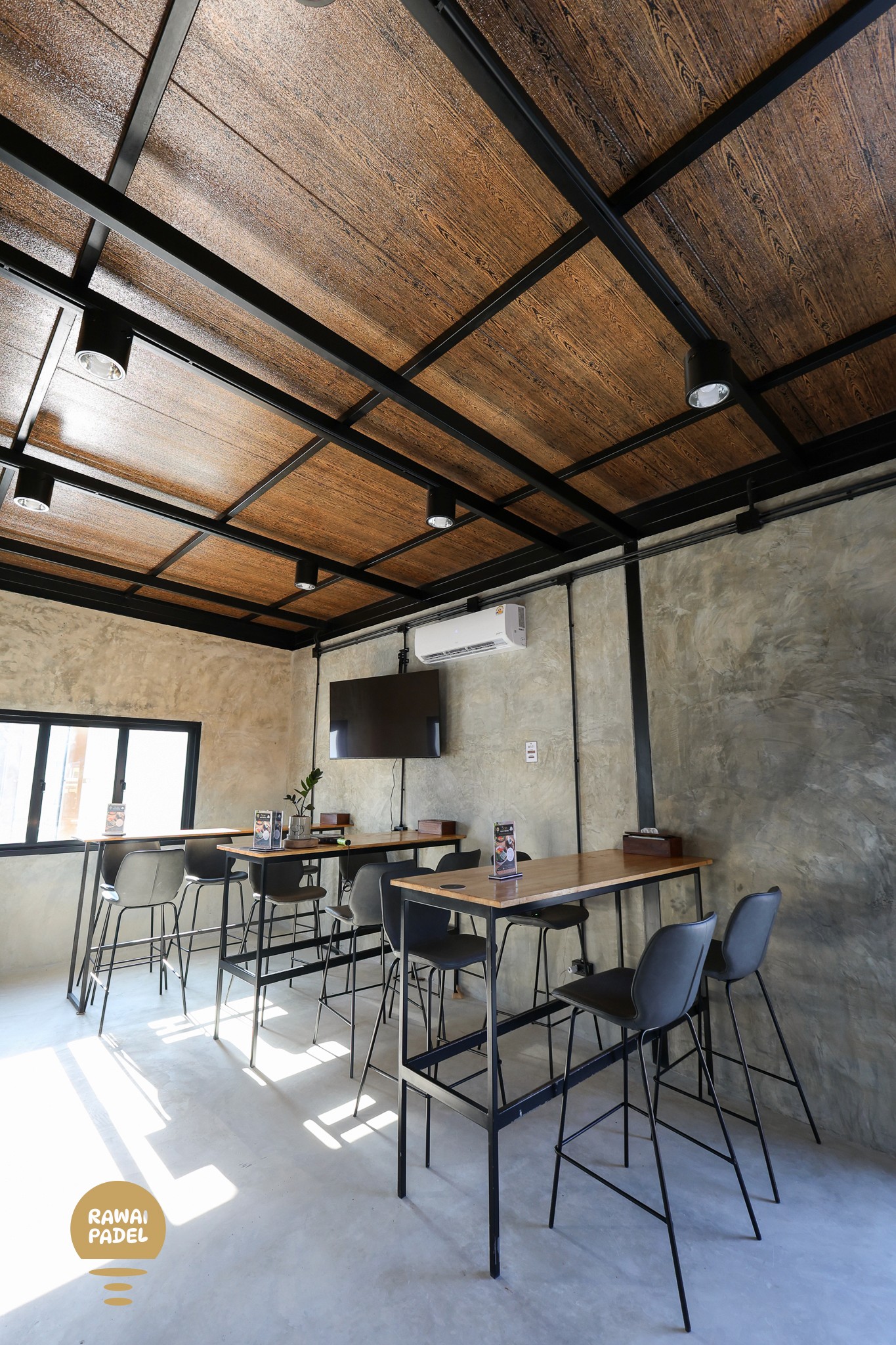 a pair of tennis rackets and balls on the ground