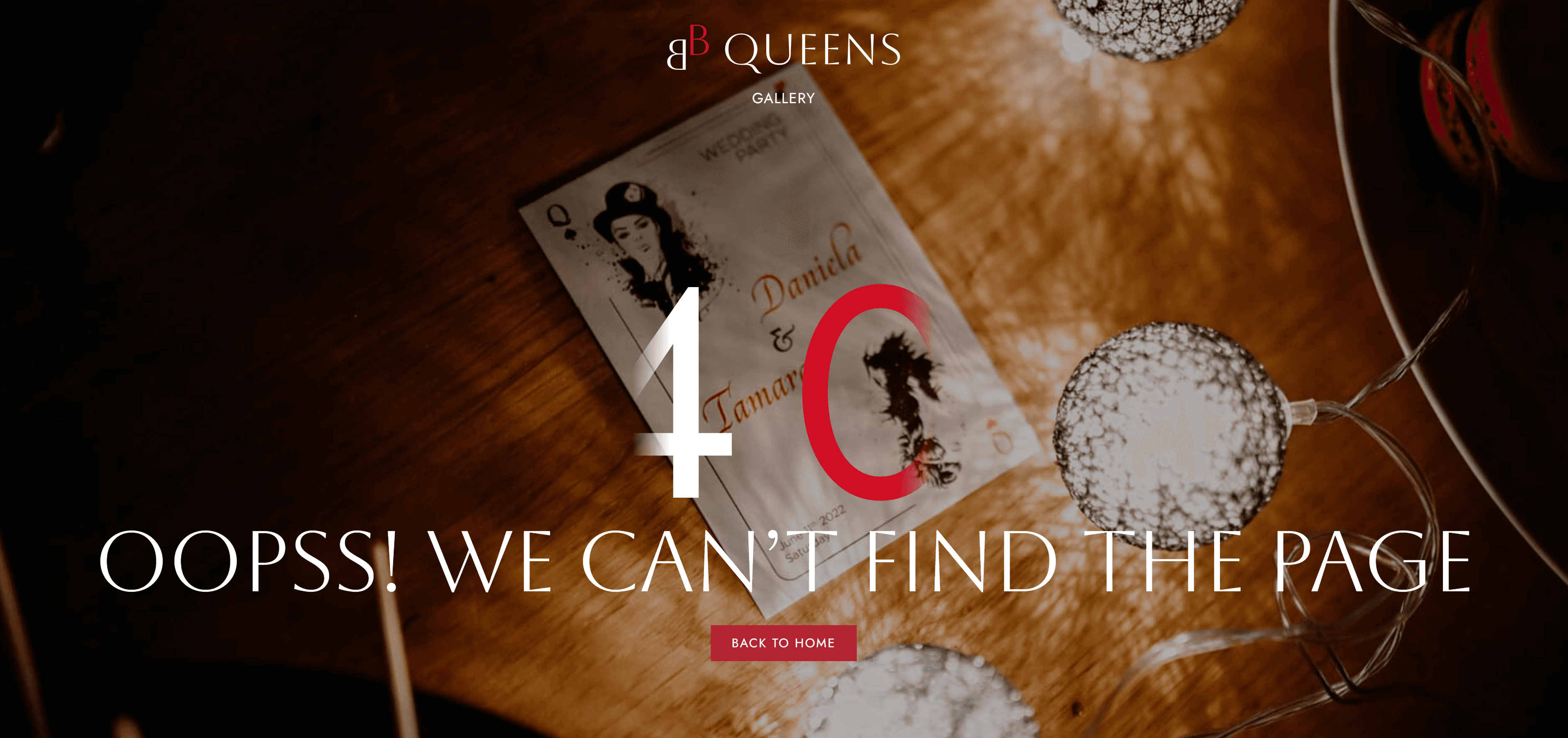 Close-up of model in orange and black outfit behind glass