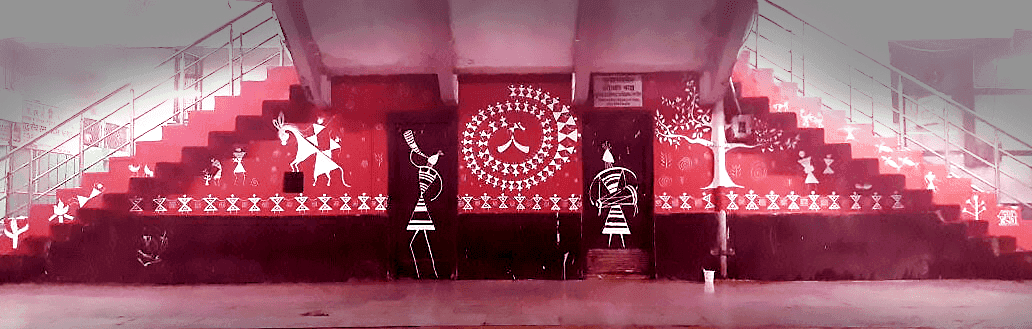 Mural painting in the style of Warli tribal painting at New Delhi railway station.