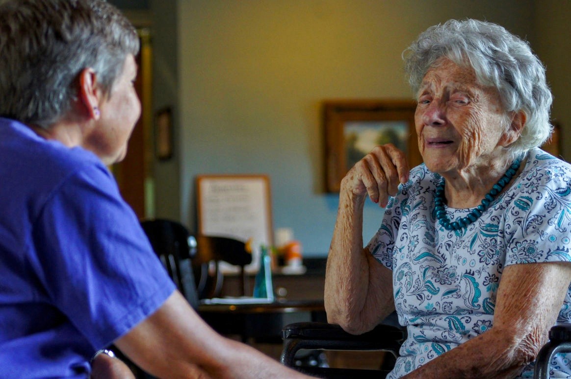 Resident and staff enjoying each other's company at Rock Creek Manor, Jasper GA