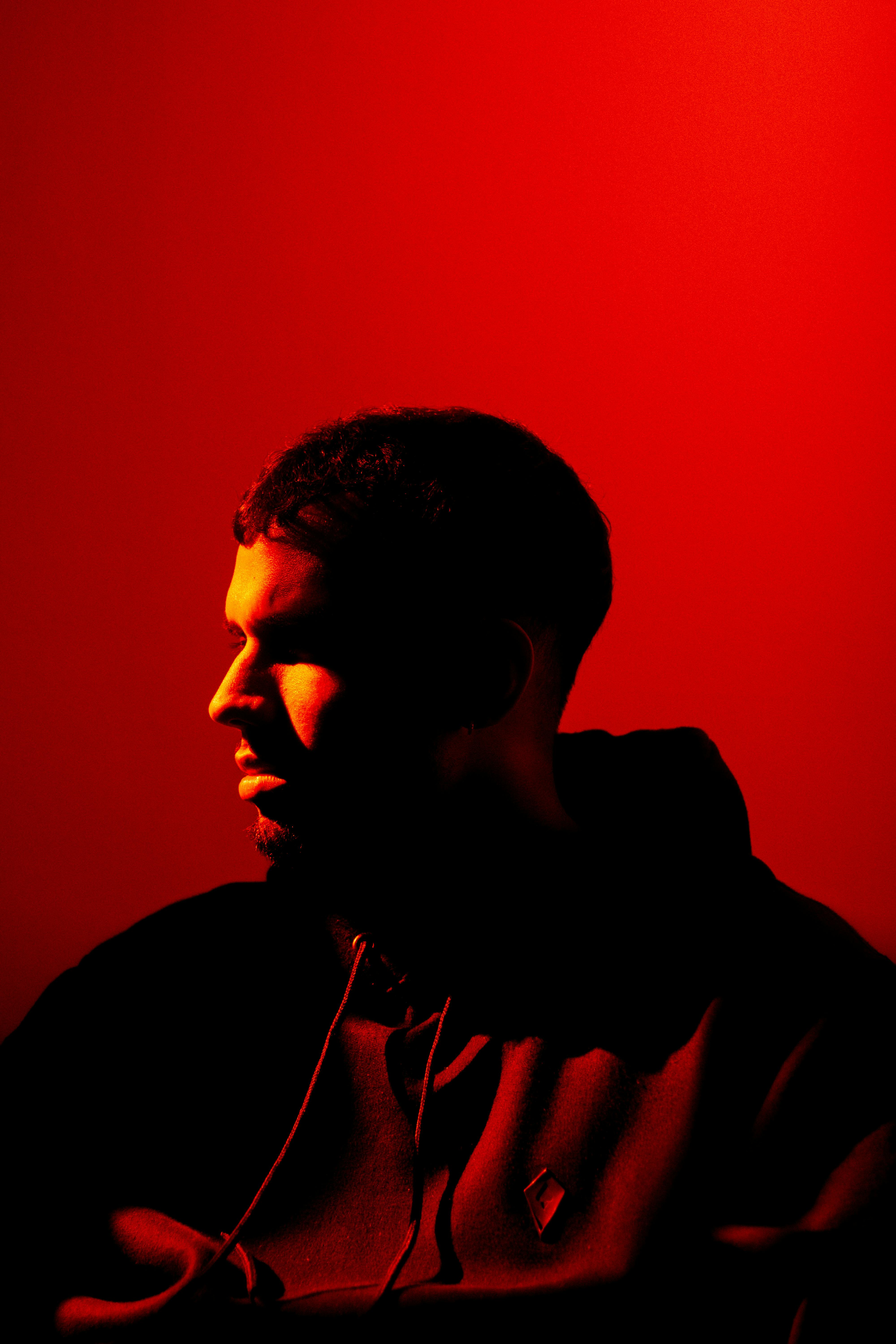 Man portrait on red background