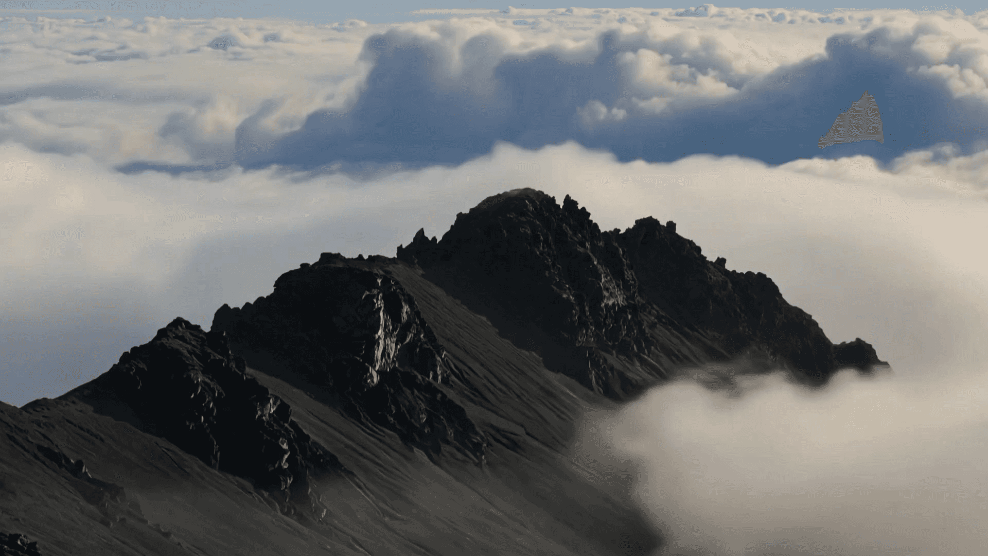 Rocky mountain summit representative of House of Growth helping clients navigate dynamic terrain to scale.