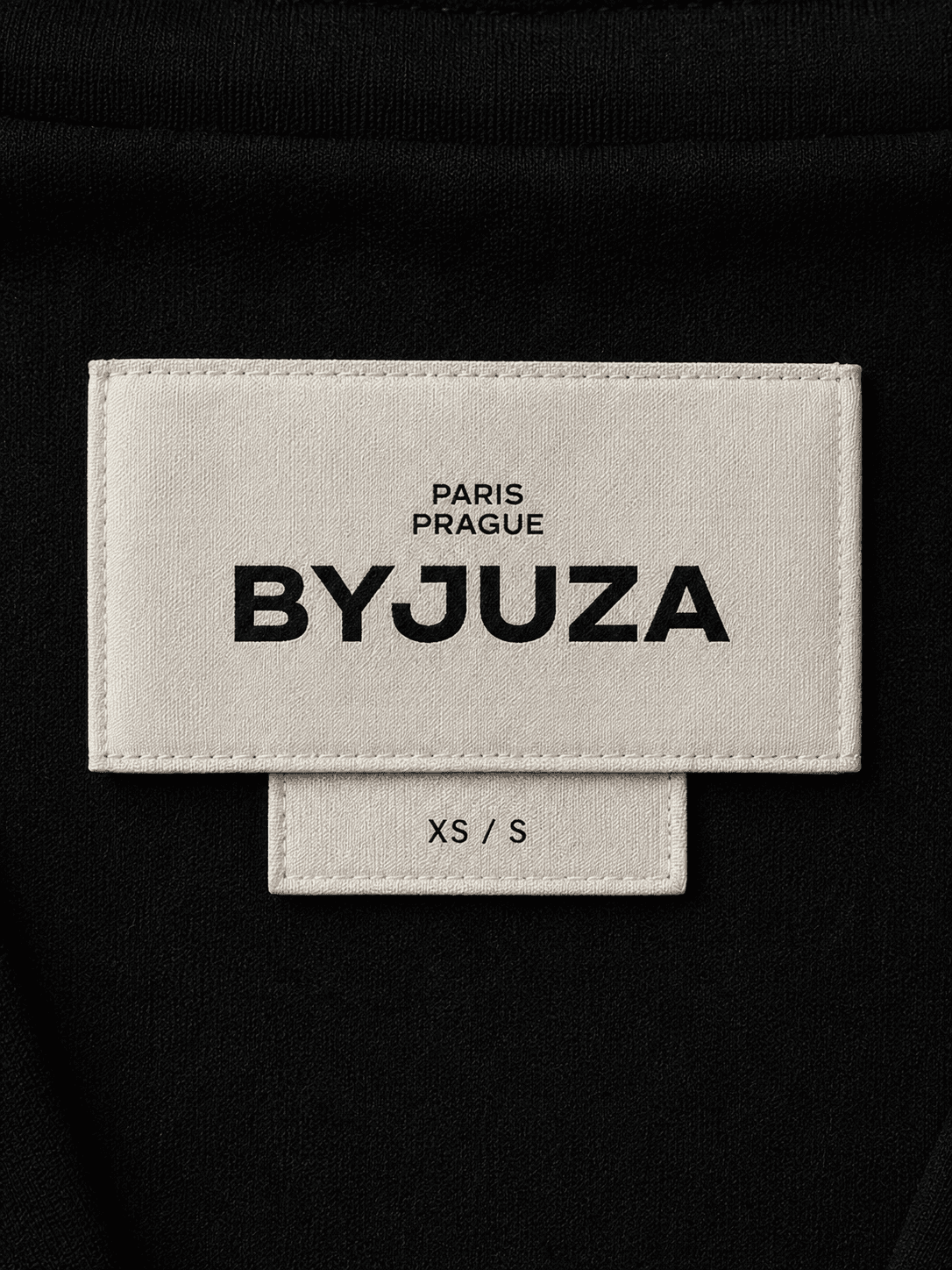 ByJuza menswear branding with minimal typography and a confident fashion aesthetic