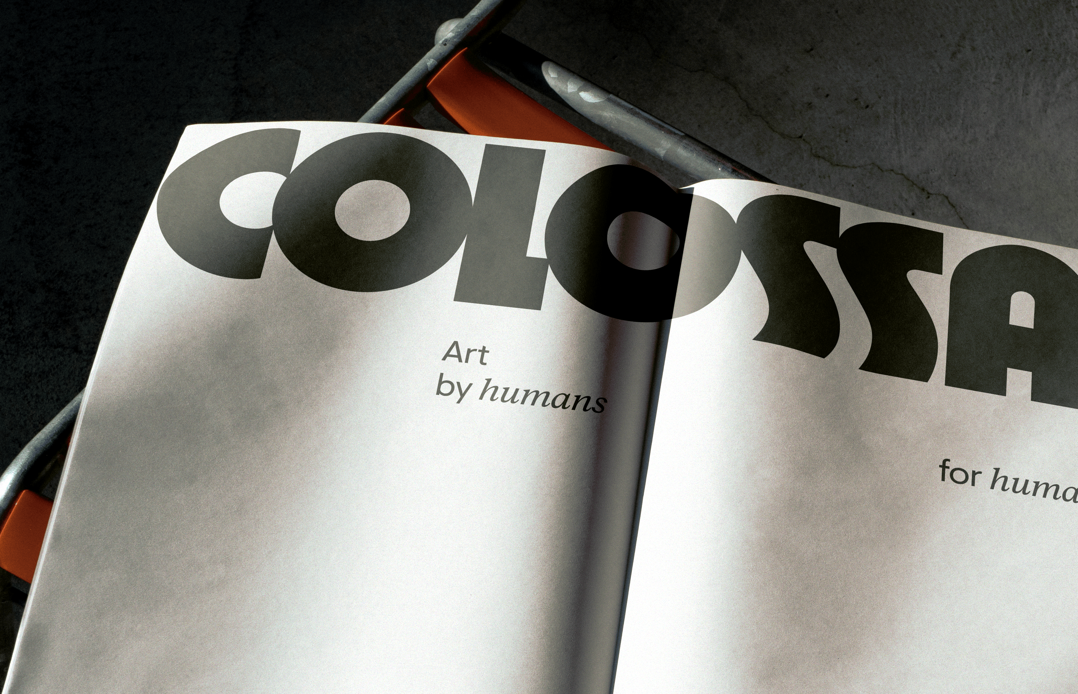 Colossal logo on newsprint