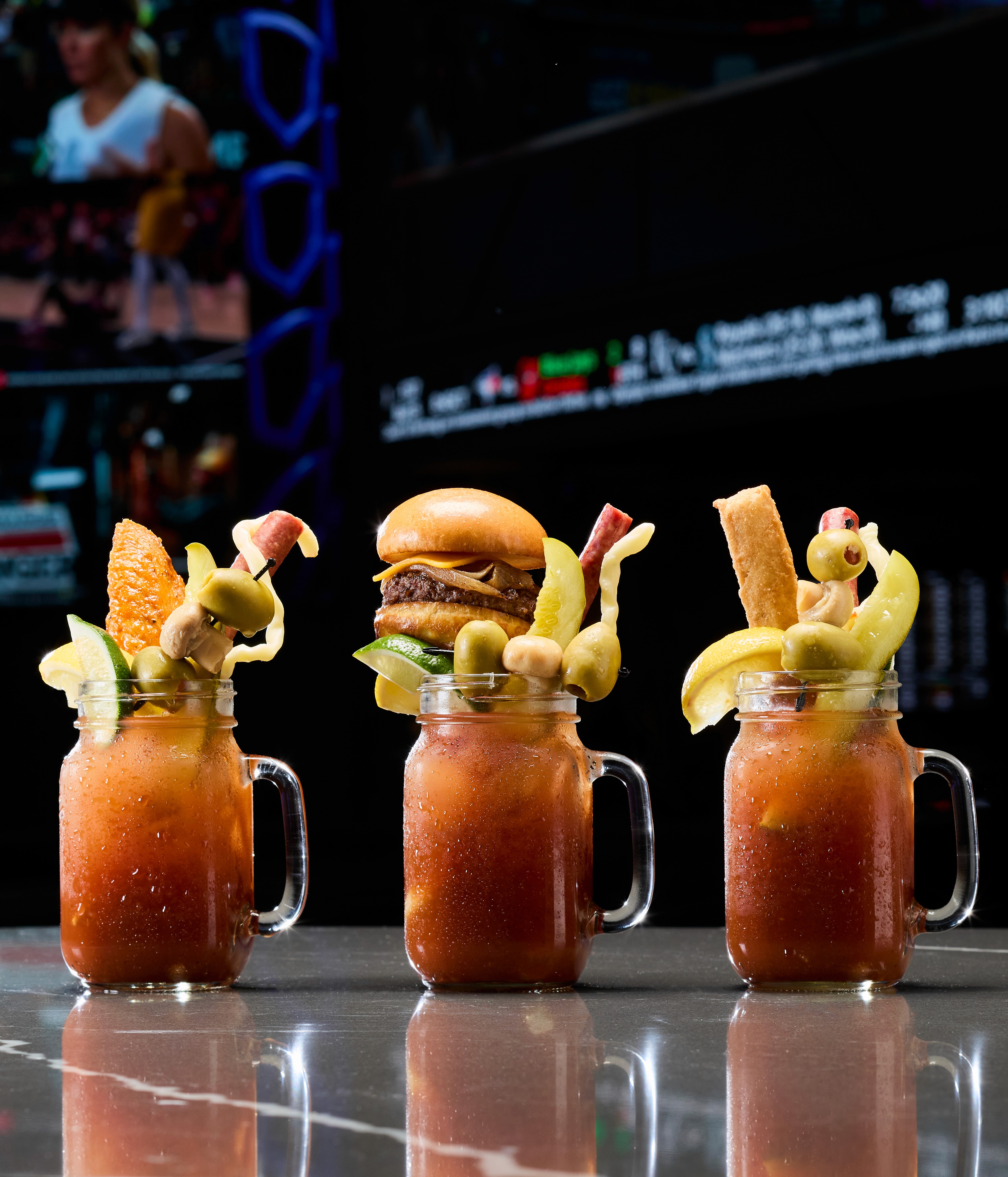 Three elaborate bloody mary cocktails