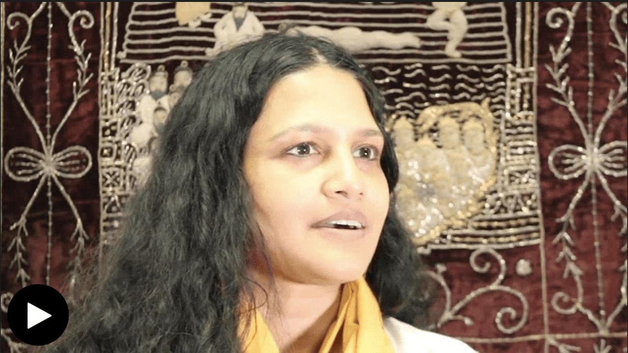 Dhanani (speaker) close up of face in front of chod pata