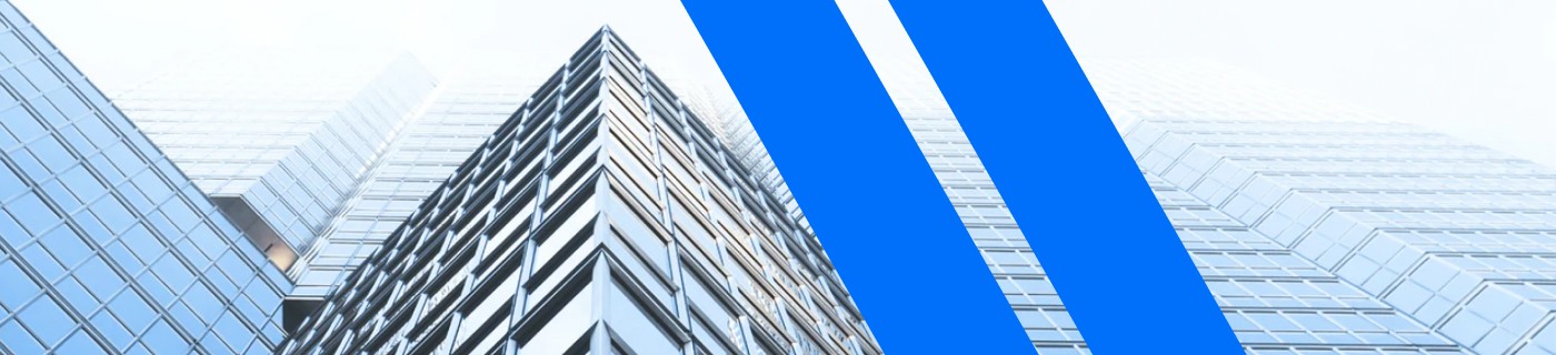 person sitting on grass and using phone