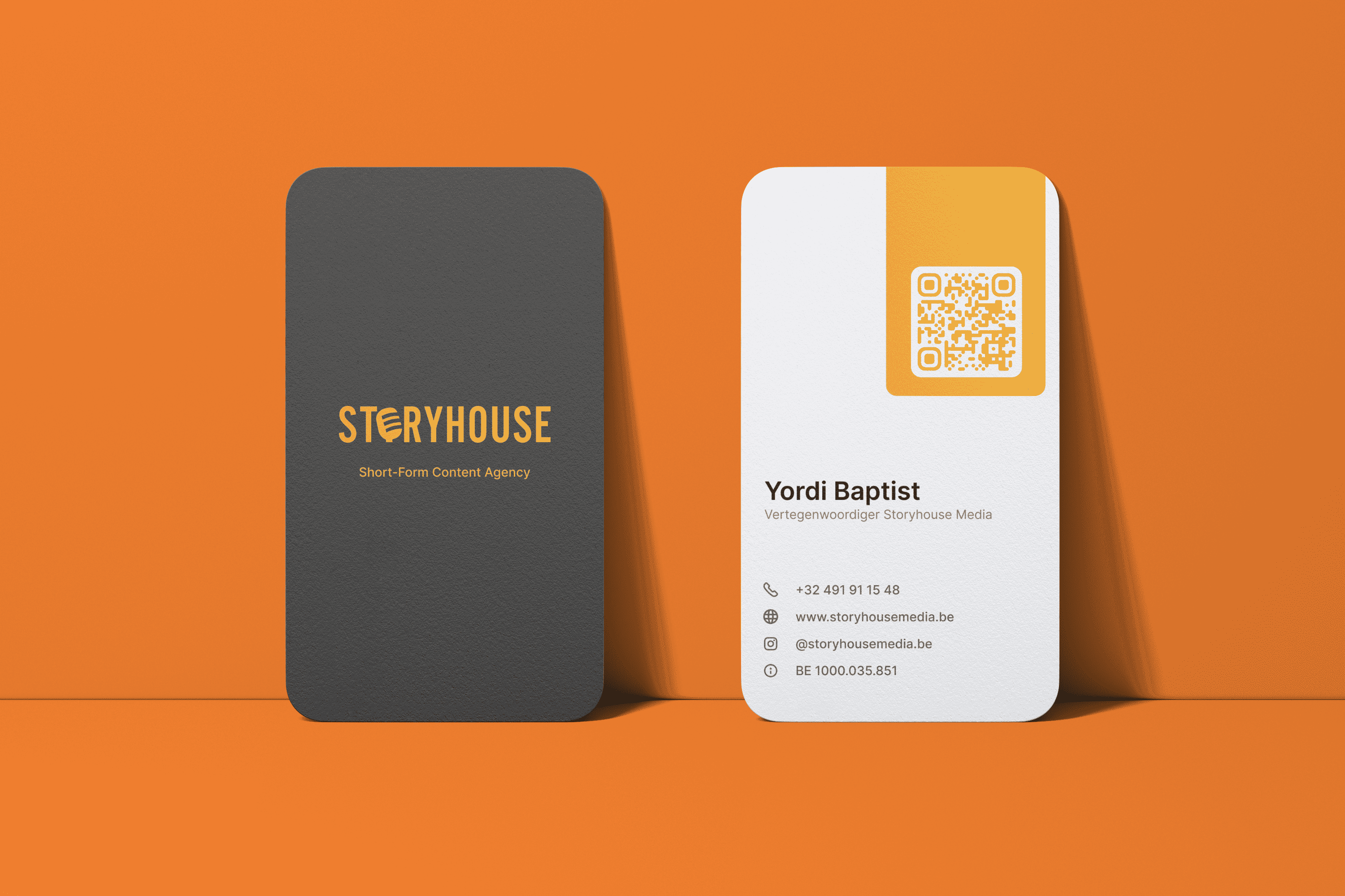 Storyhouse Media business card mockups showing the logo side and contact details.