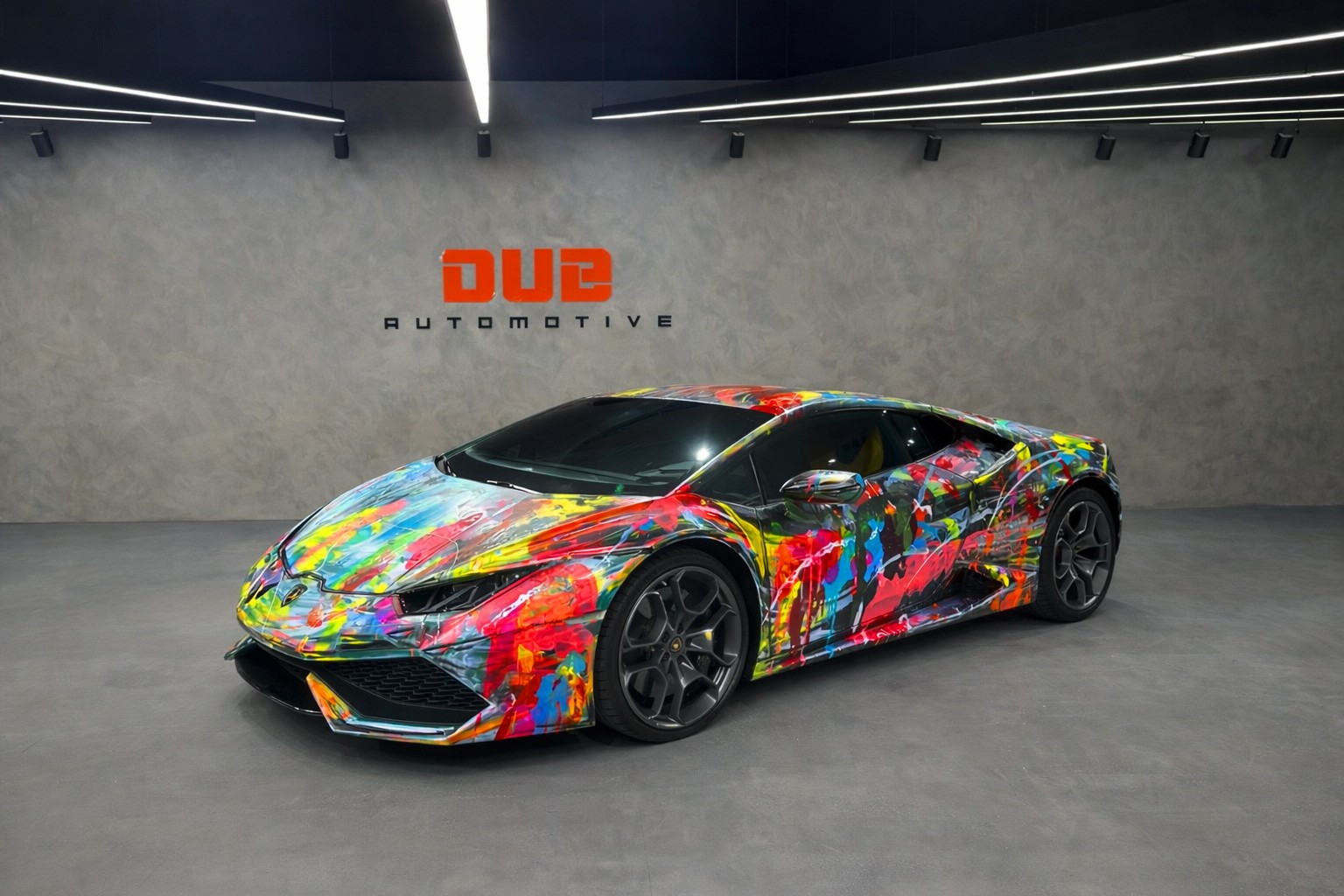 Lamborghini Huracán featuring a custom multi-colored abstract "Art Car" paint design in Dub Automotive