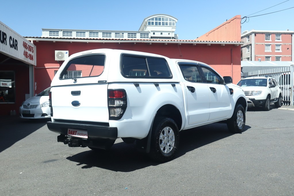 man in white crew neck shirt wearing black framed eyeglasses
