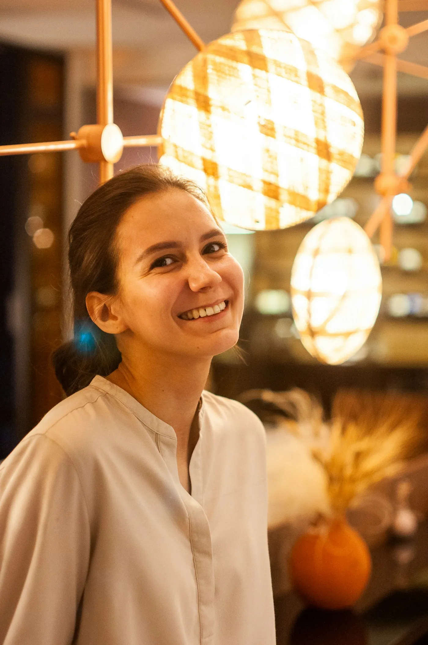Smiling hospitality worker in a restaurant