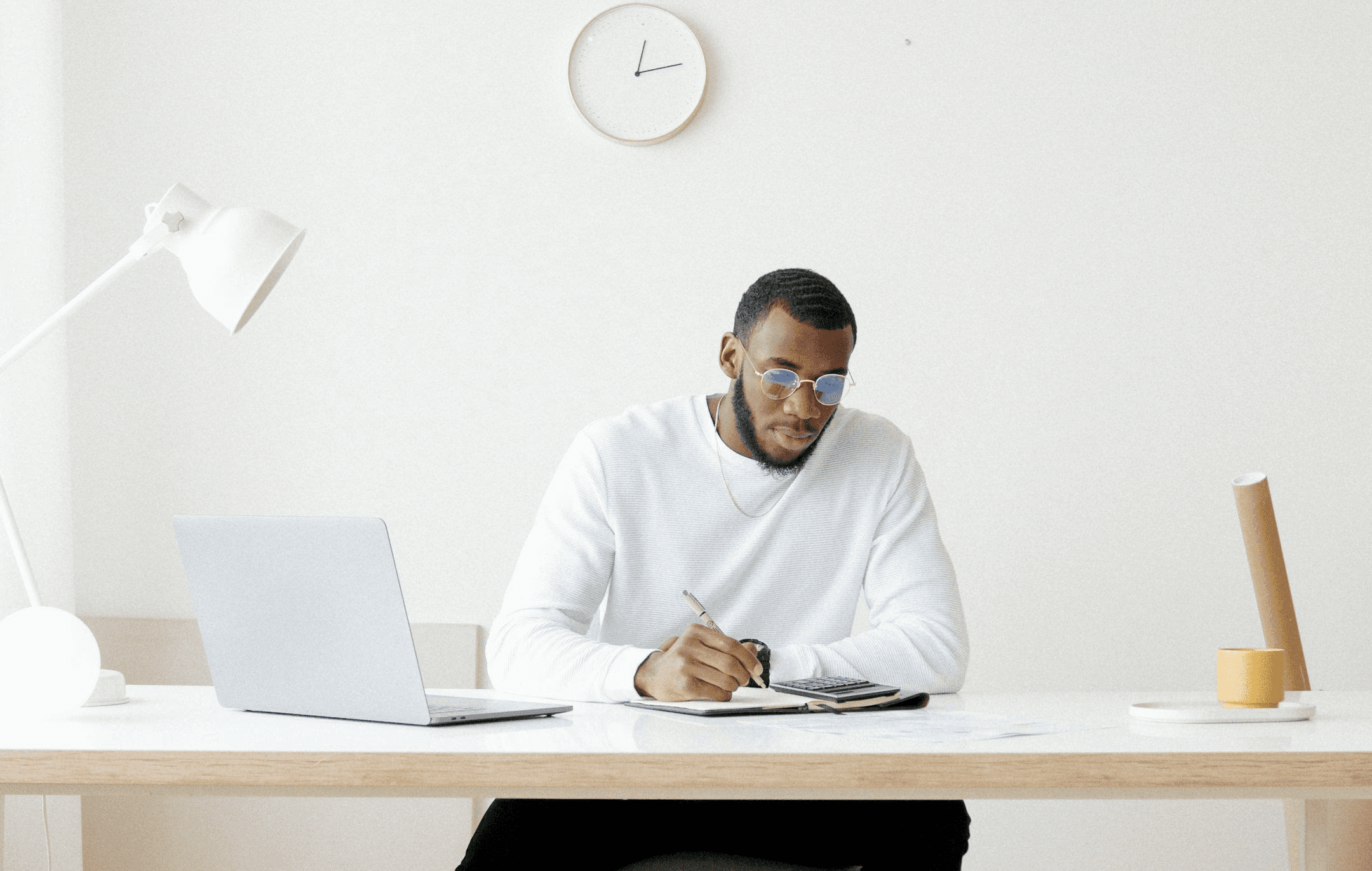 Professional writing notes at a desk