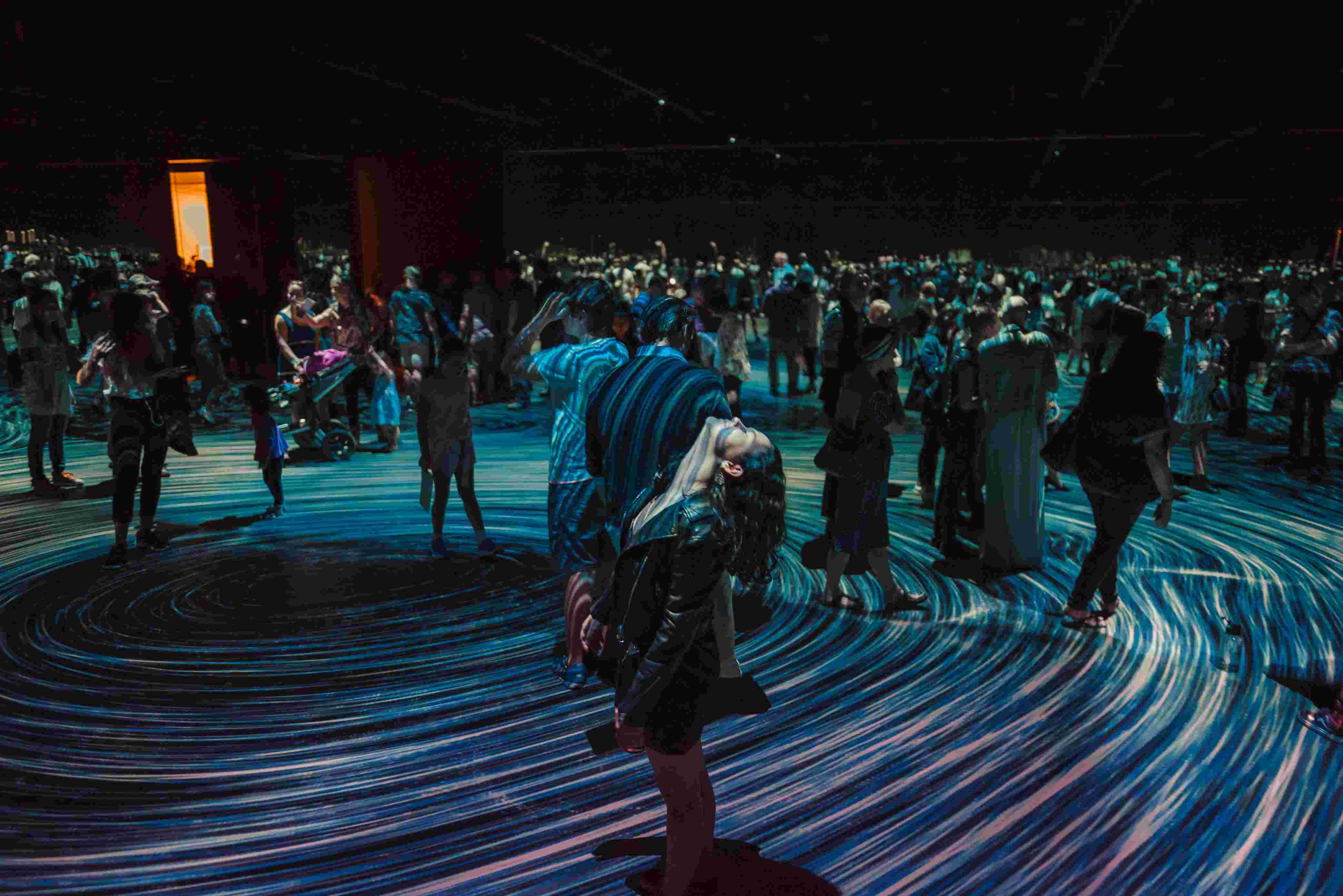 Projection mapping example 2 focused on a woman in a crowd