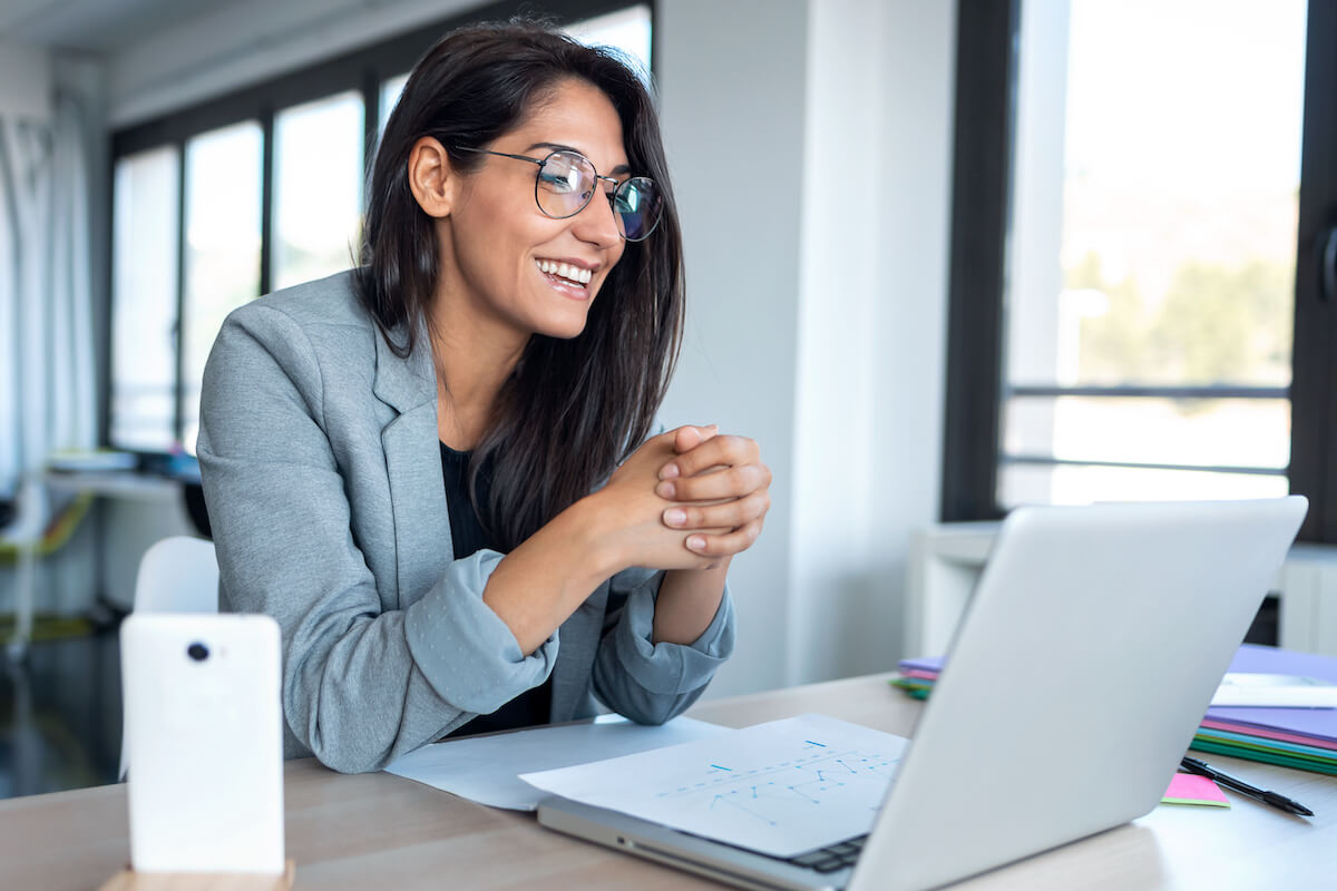 Smiling woman on a video conference