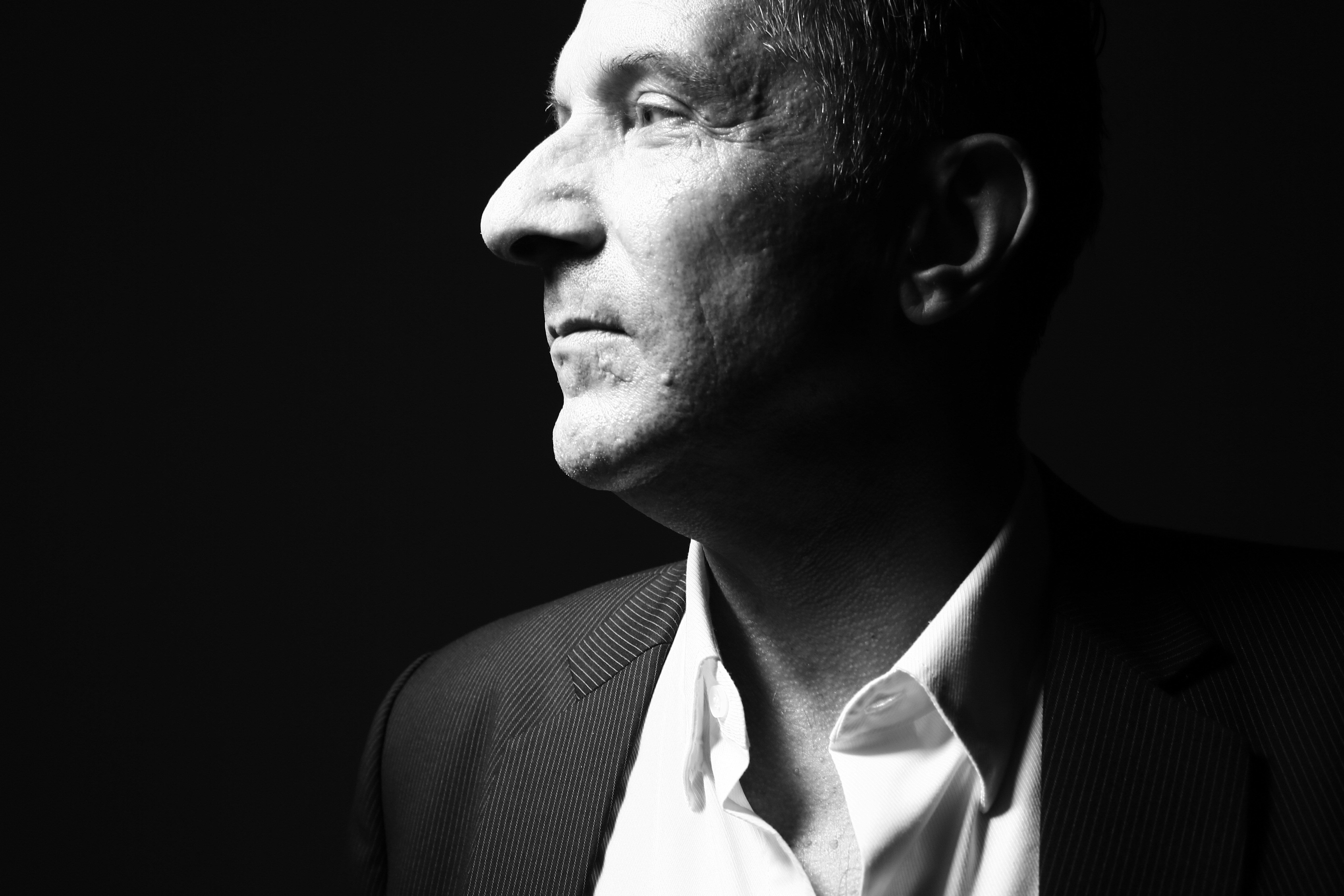 man in black suit jacket