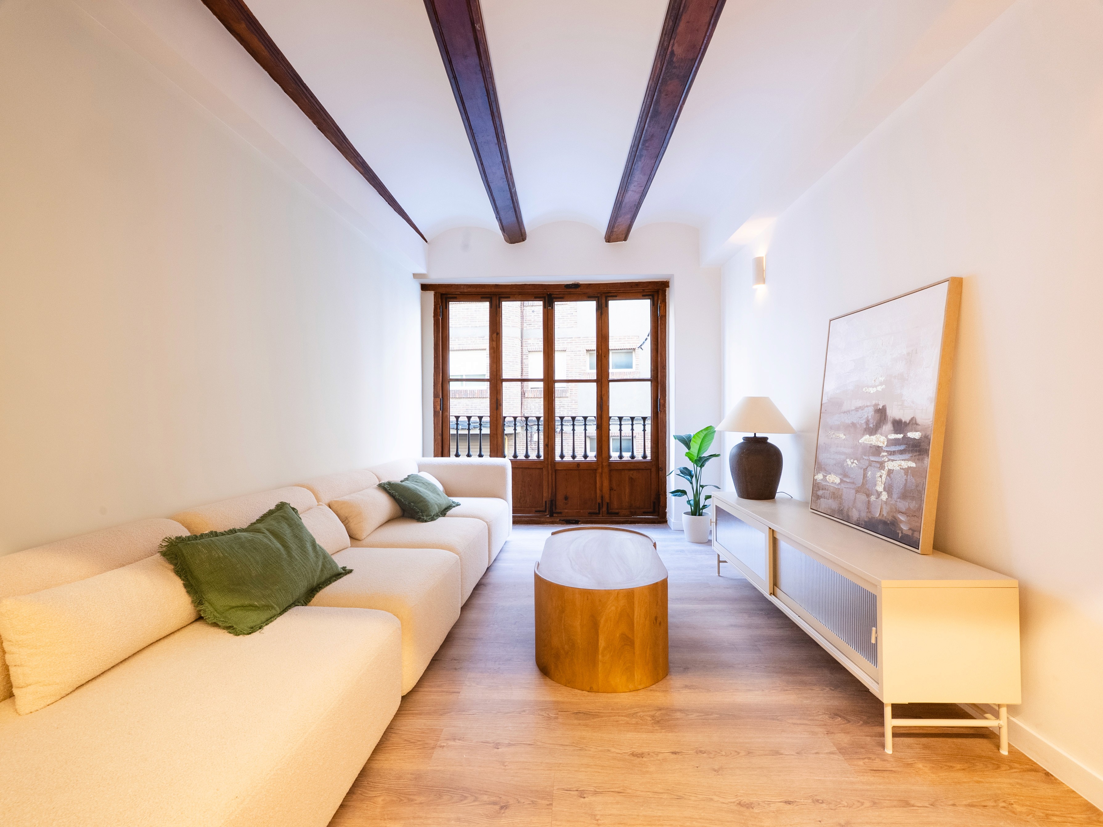 Photo of a beautiful light kitchen with big windows