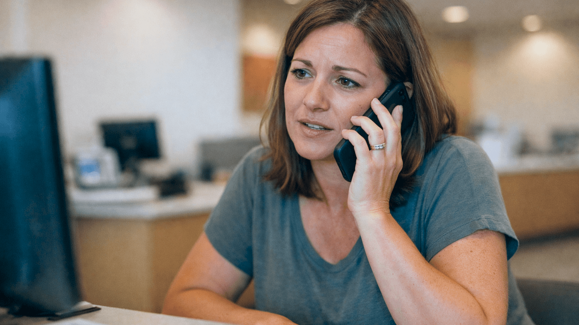 Credit union staff member calling CU*NorthWest for single-point core banking support