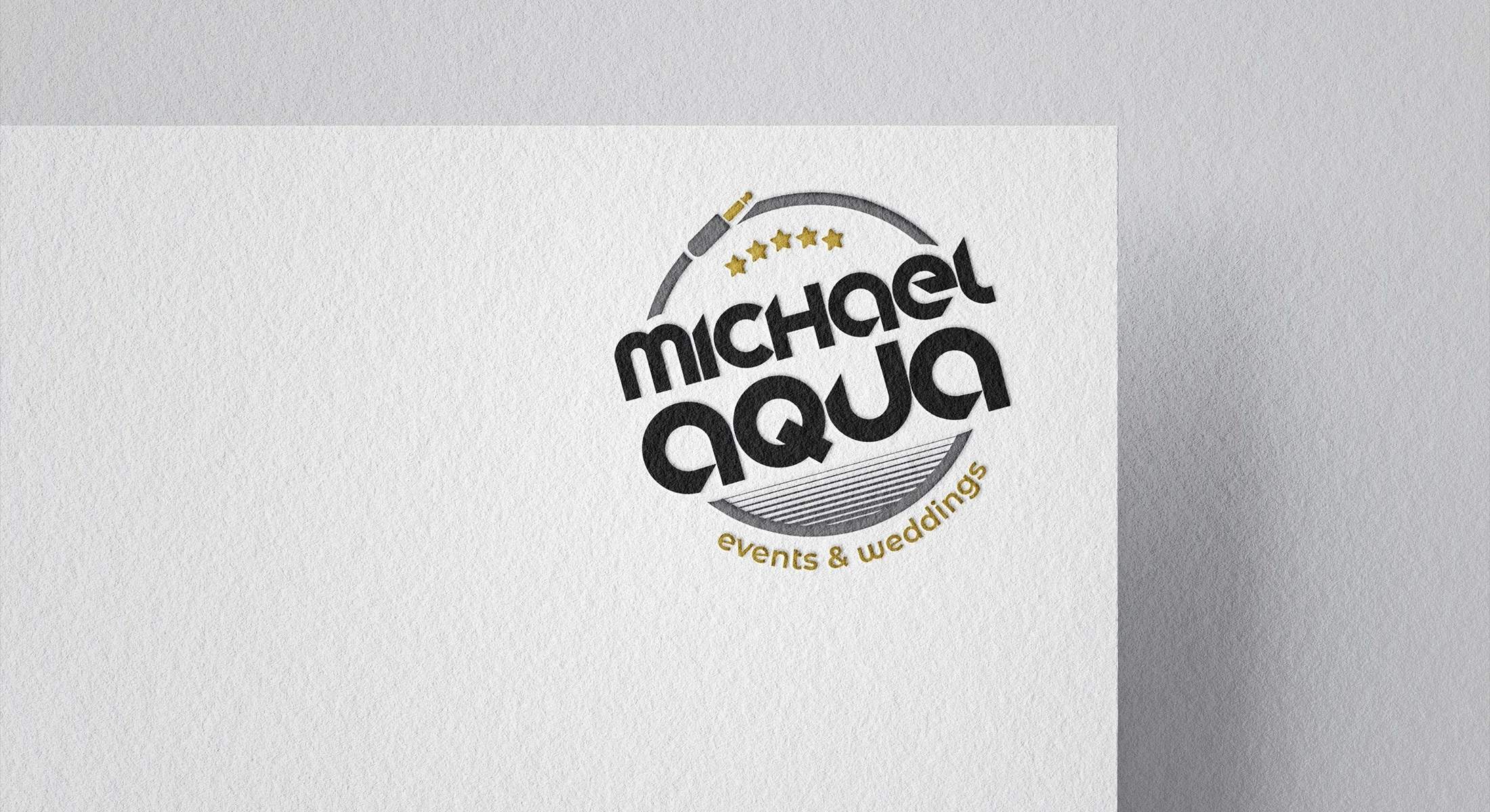 Logo Micheal AQua - aplikacja na kartce papieru