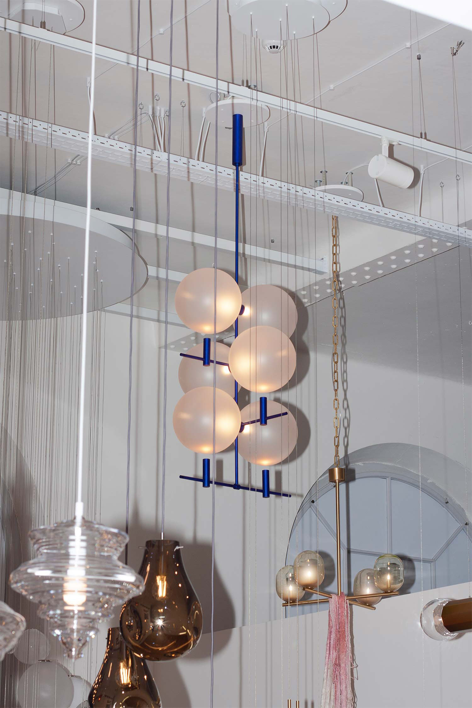 Modular Luna II lighting system showing structural repetition across multiple vertical configurations by Jiri Krejcirik