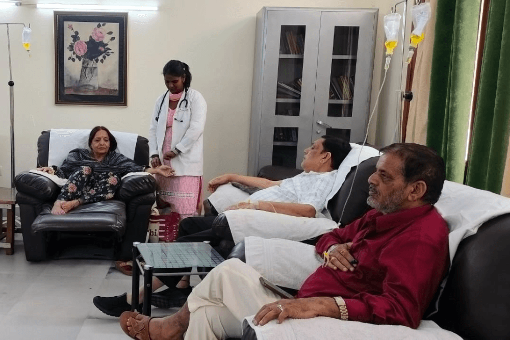 Patients receiving Artery Chelation Therapy (ACT) at Sibia Medical Centre in a comfortable and well-equipped setting. A healthcare professional administers the treatment intravenously, ensuring personalized care and patient safety for managing heart disease and improving vascular health.