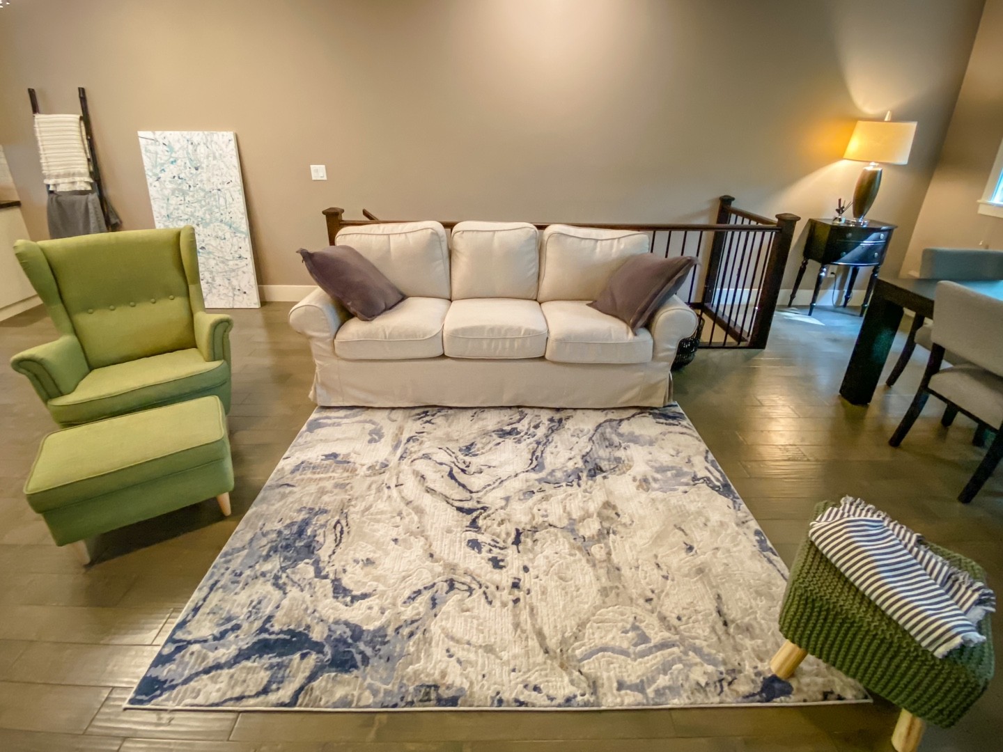 a group of young children riding skis down a snow covered slope