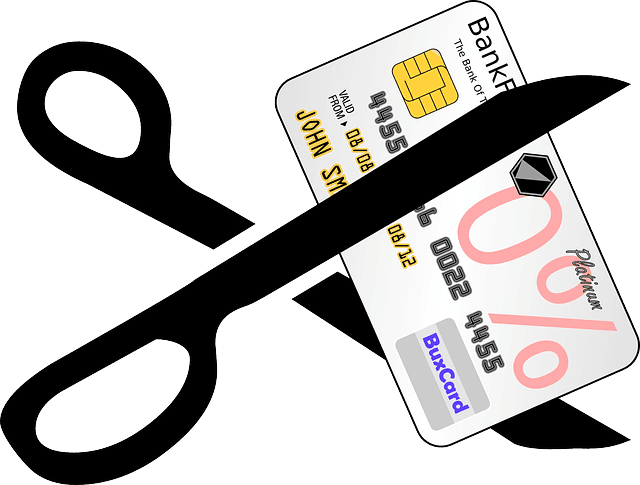 Illustration of scissors cutting a credit card