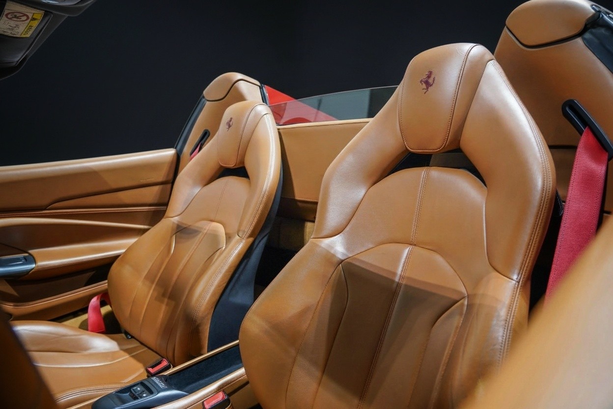 Ferrari F8 Spider 2023 luxury leather seats and interior details, exotic Ferrari rental experience in Dubai