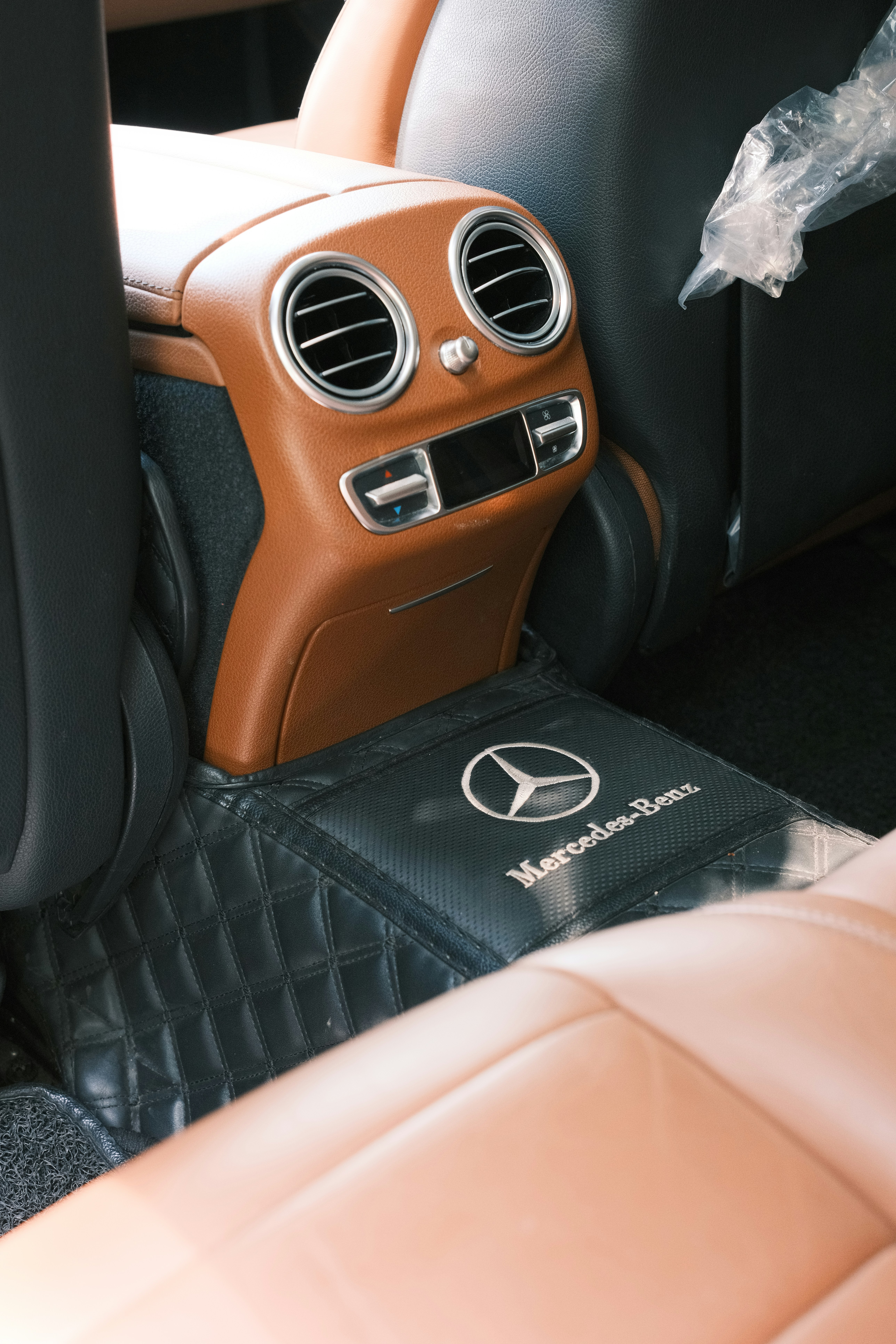 Mercedes-benz car interior with a back seat console.