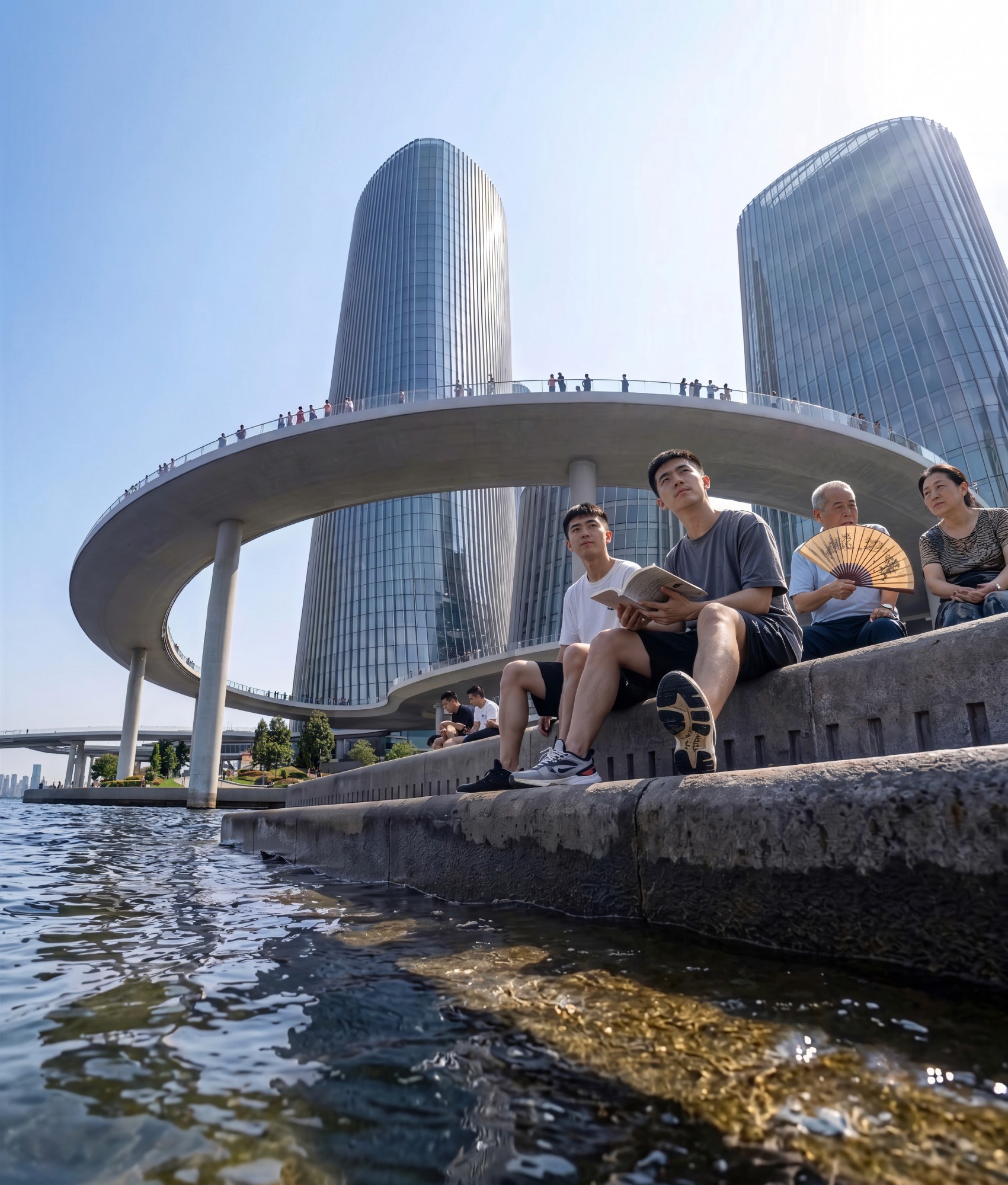 Architectural visualization of Halo — low-angle sunny daytime view of young people relaxing by the water's edge under the grand elevated ring walkway, Shenzhen, China