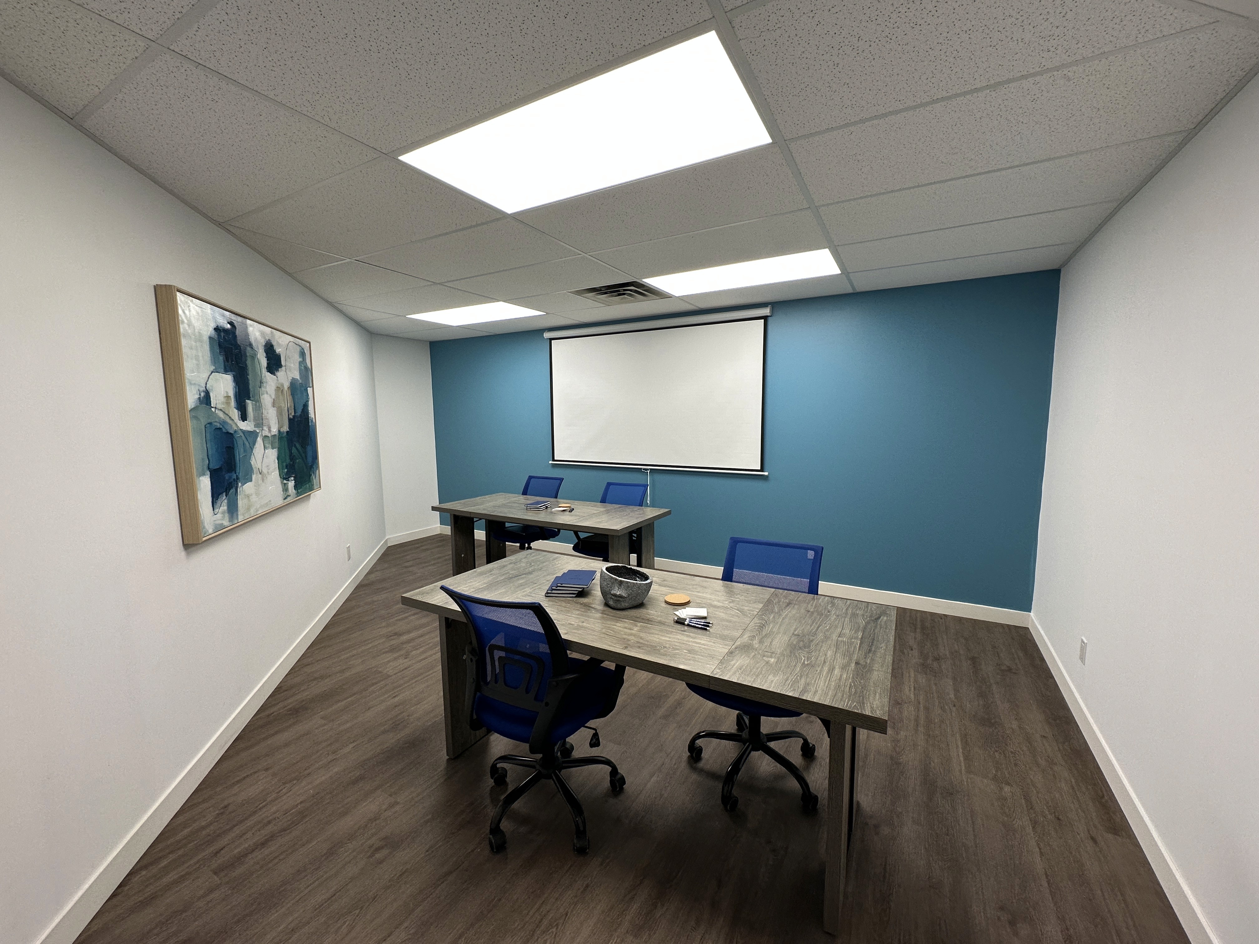 a doctor showing a patient something on the tablet