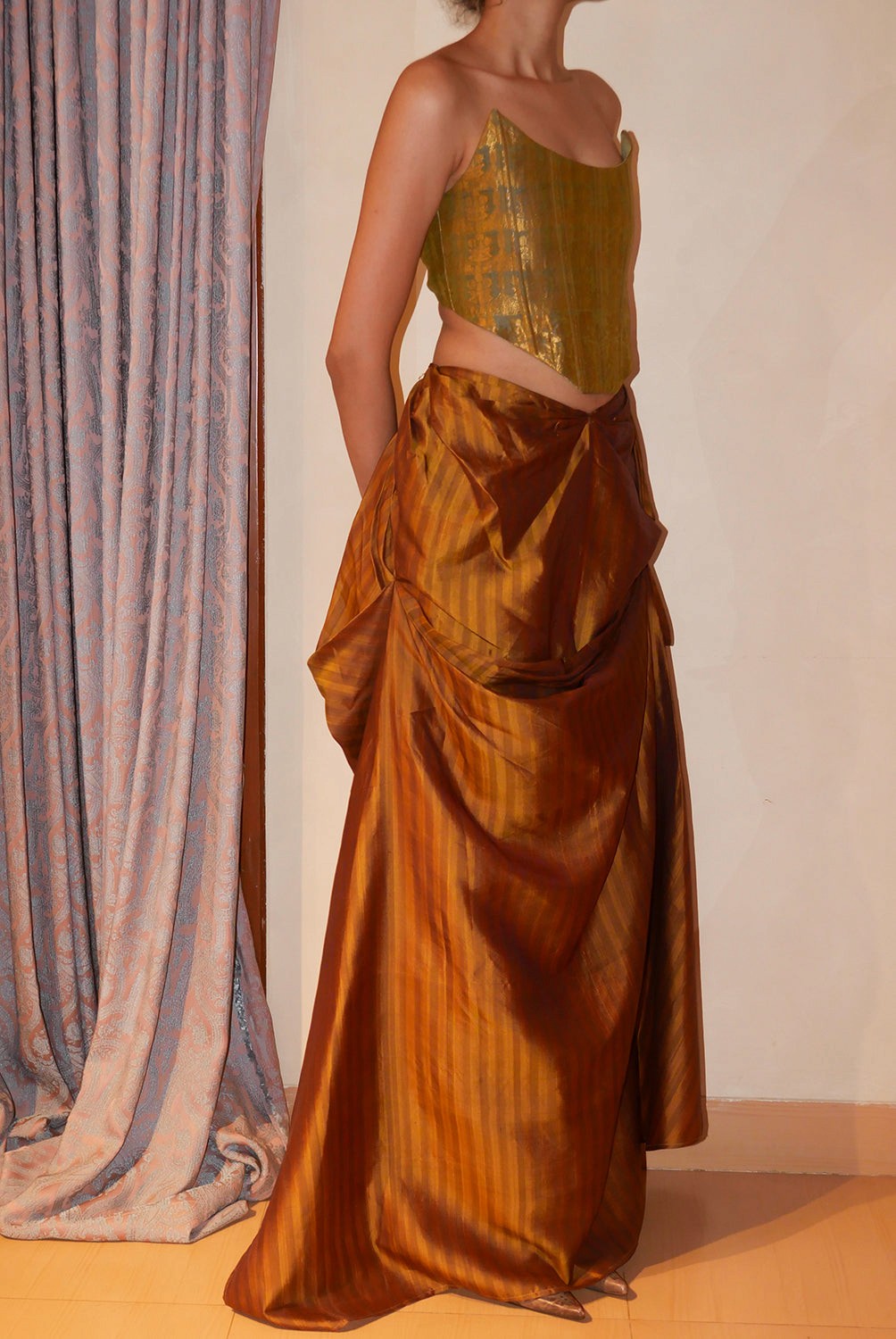 Guljhaam, is our one of a kind skirt, handcrafted by skilled artisans, in house using vintage silk saree, celebrating elegance and ease.