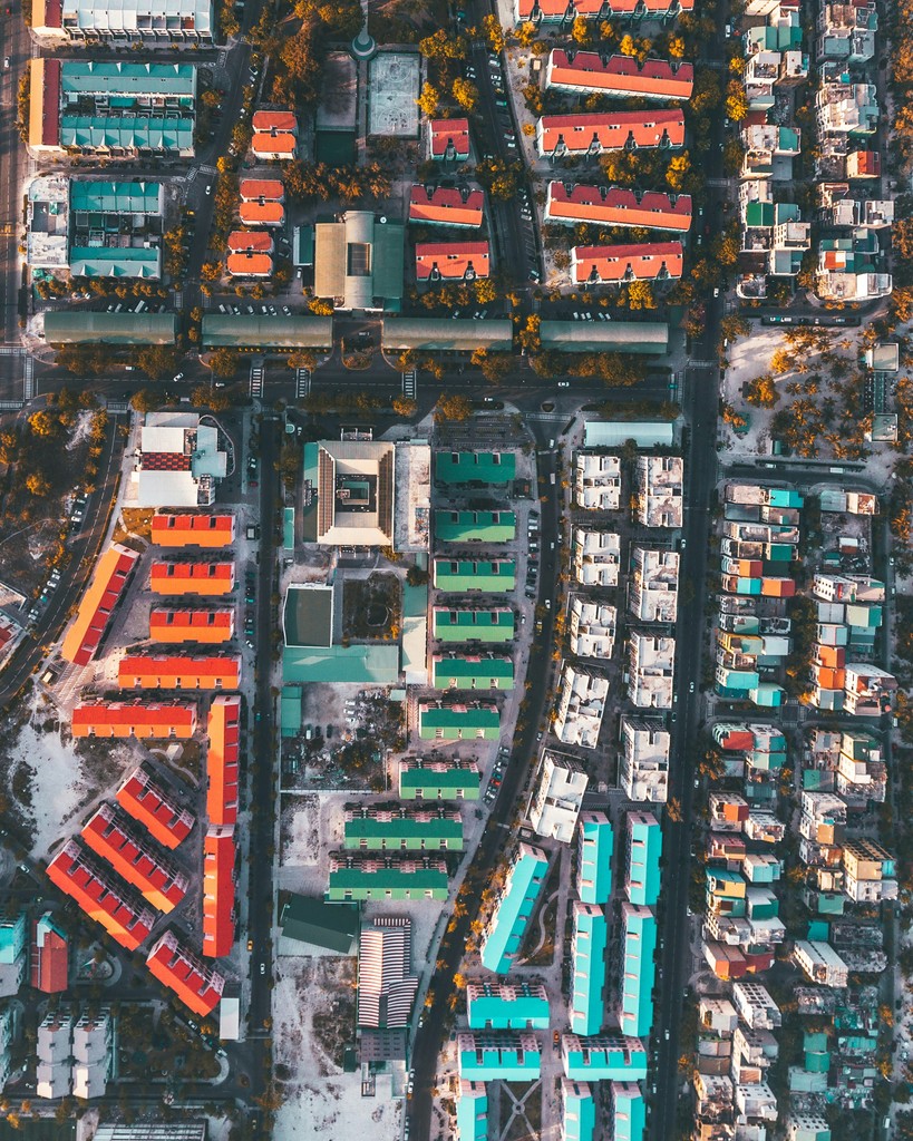 Aerial view of colorful buildings in a city.