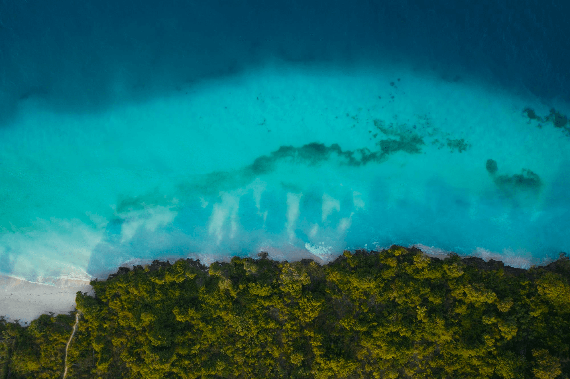 beach under white cloudy sky