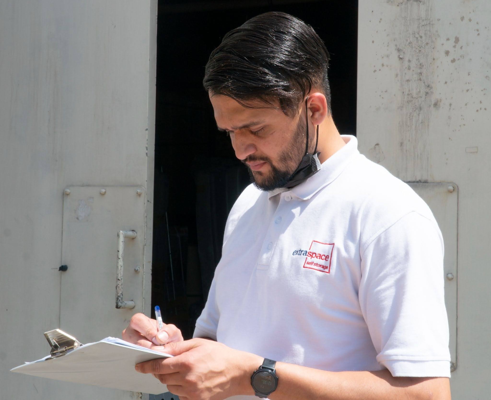 Man reviewing essential documents for Dubai Customs clearance