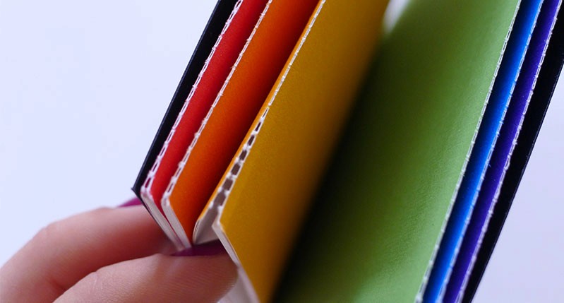 colored paper design with dashed cut lines