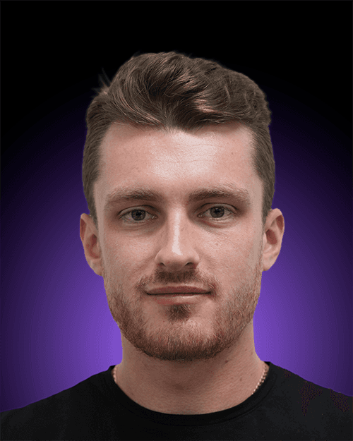 headshot of male in dark background