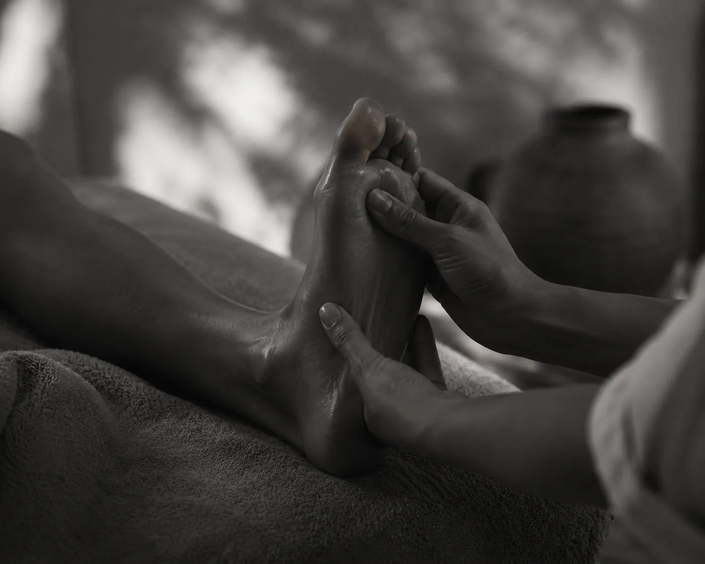 Therapeutic foot massage at the Jaali Spa