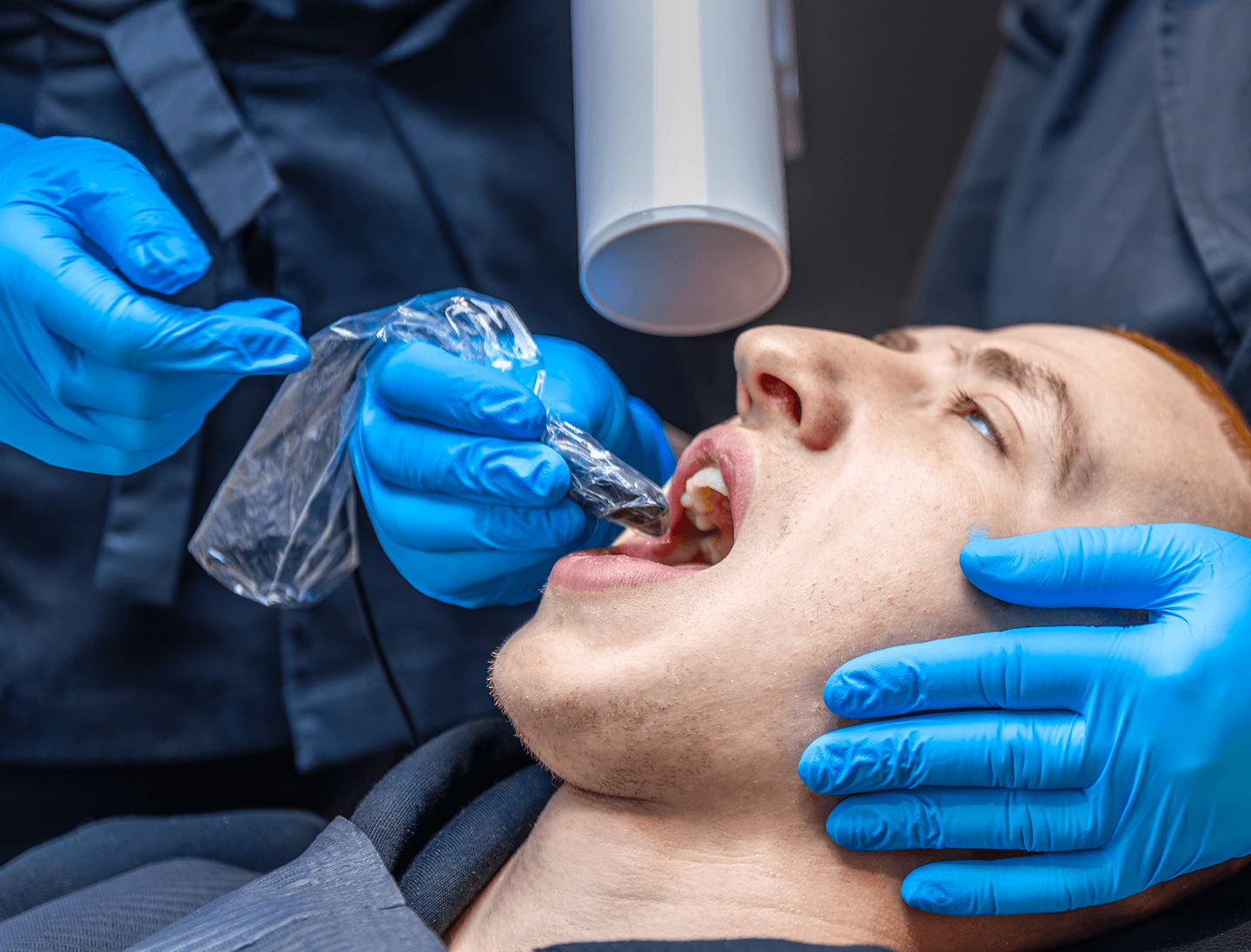 Patient getting dental X-ray procedure